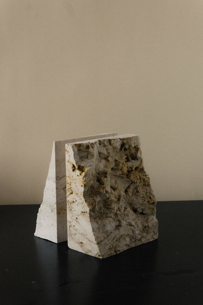 The Fragma Bookend III - Handmade Travertine Marble Bookend — close-up of textured marble surface