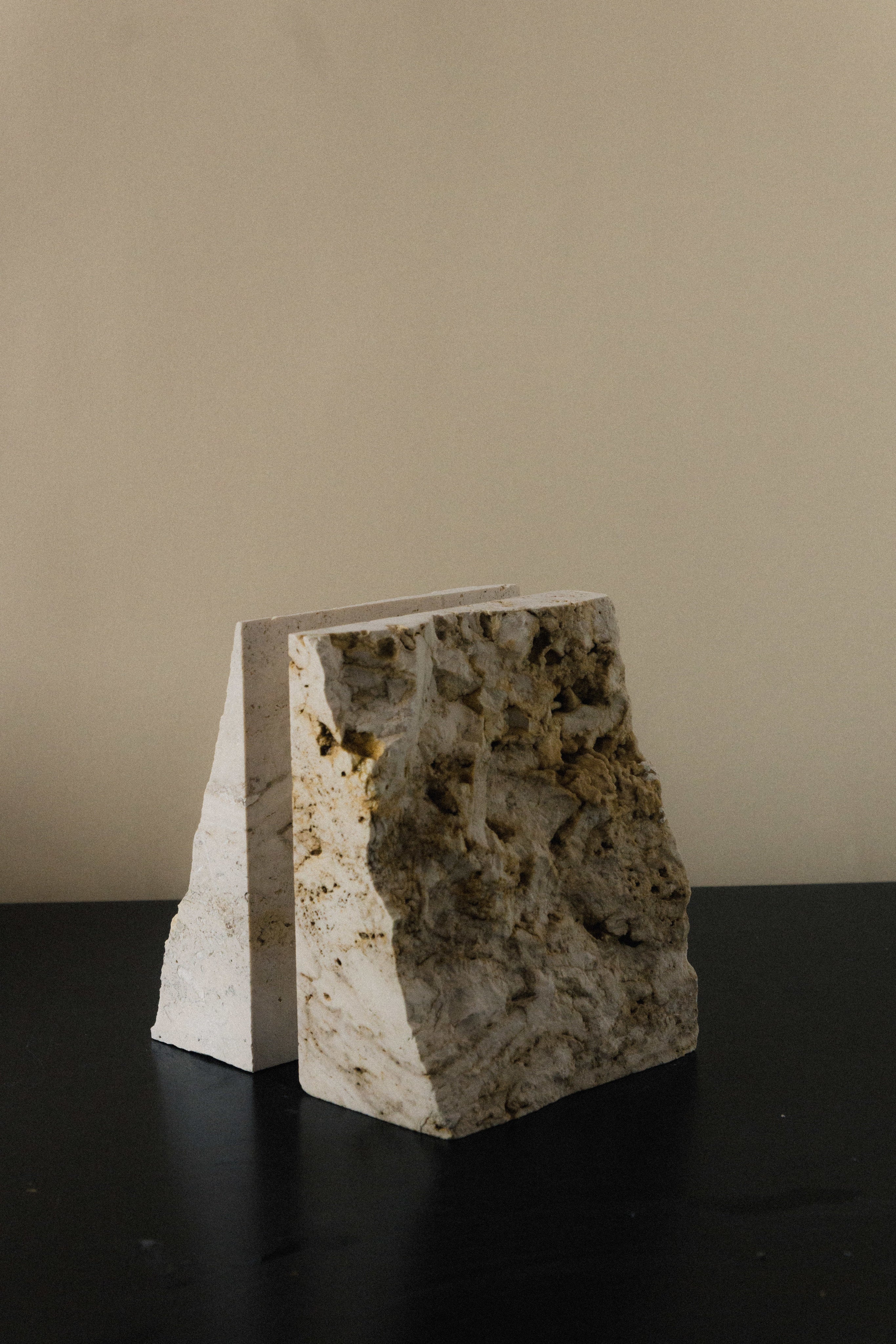The Fragma Bookend III - Handmade Travertine Marble Bookend — close-up of textured marble surface