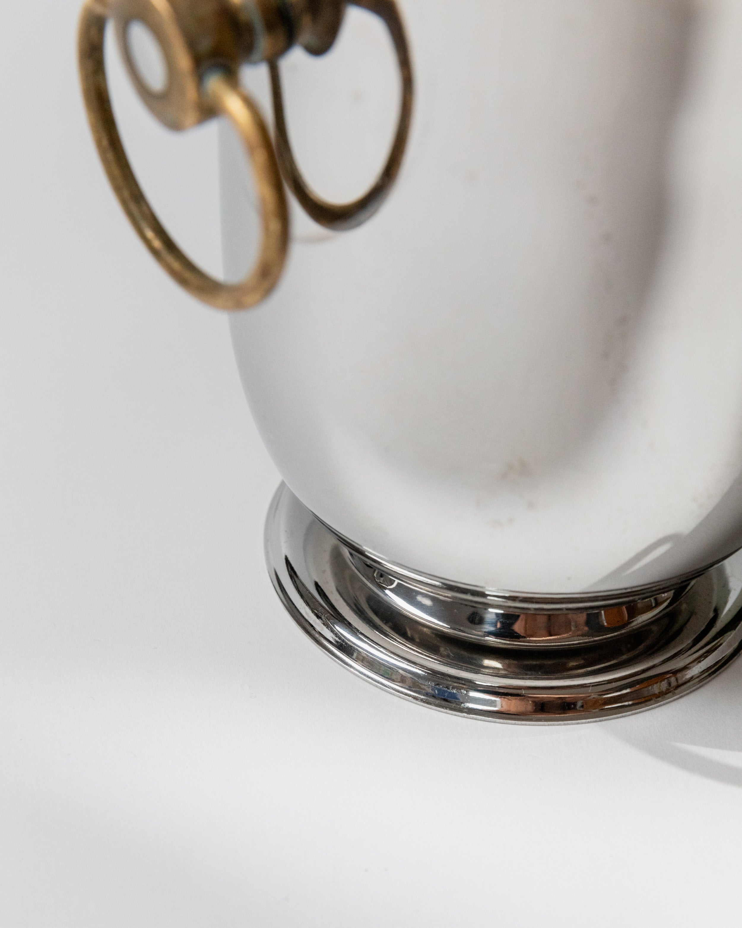 Chrome base detail of vintage champagne cooler by Jean Couzon
