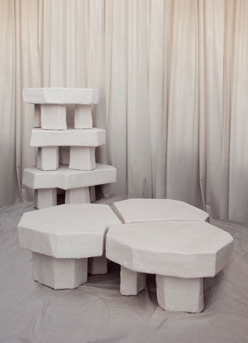Ruins white stone coffee table by Szymon Keller with geometric blocks