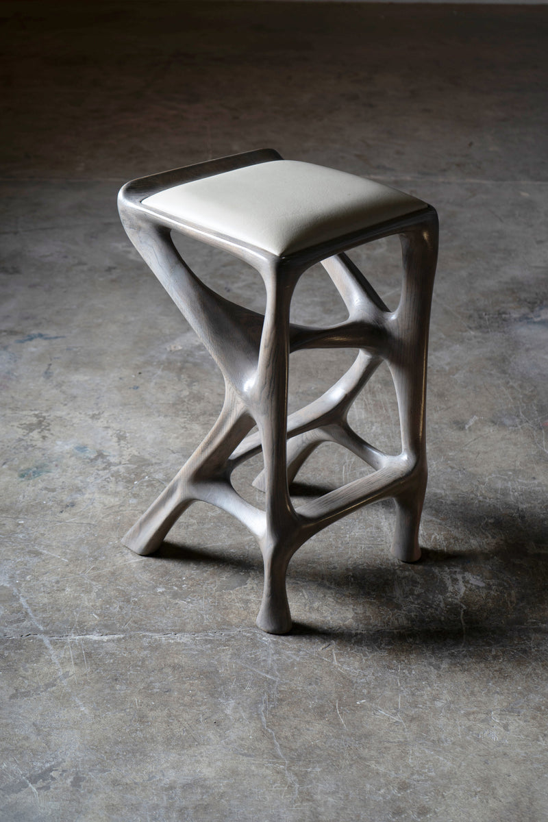 Sculptural Chimera Stool in Ash Wood with Upholstery by Amorph | The Oblist
