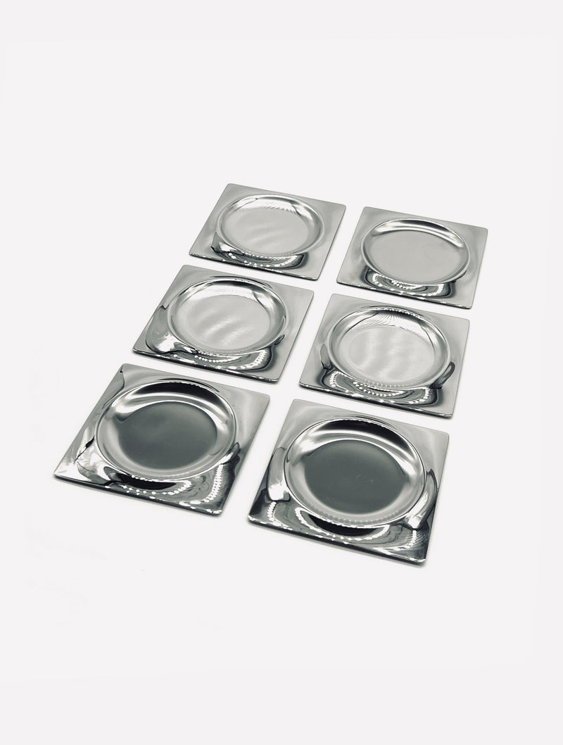 Set of six vintage stainless steel coasters with square design