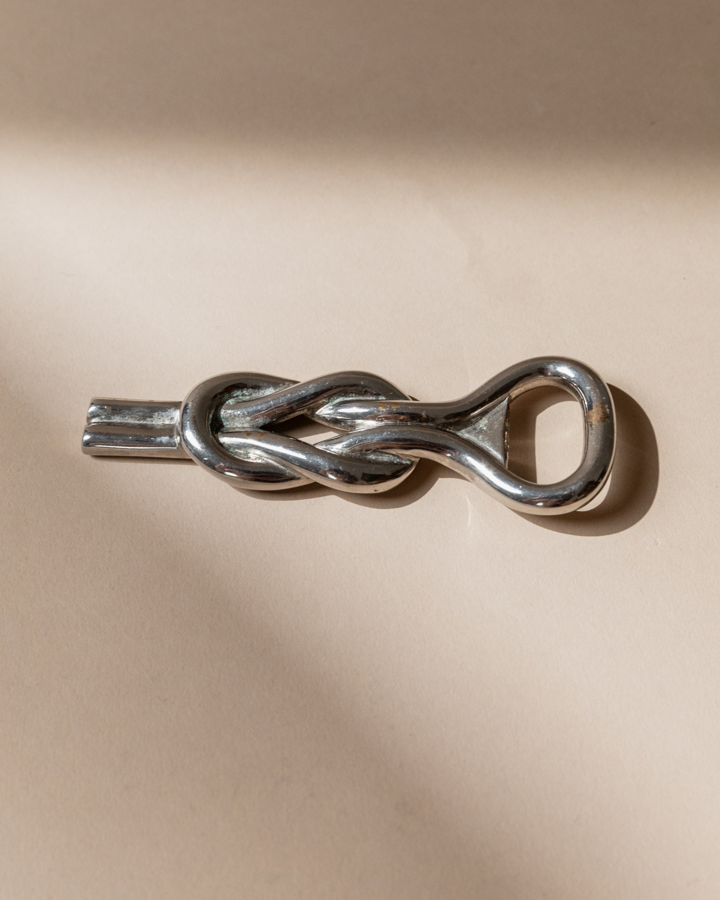 Ouvre-bouteille plaqué argent, Italie, années 1960