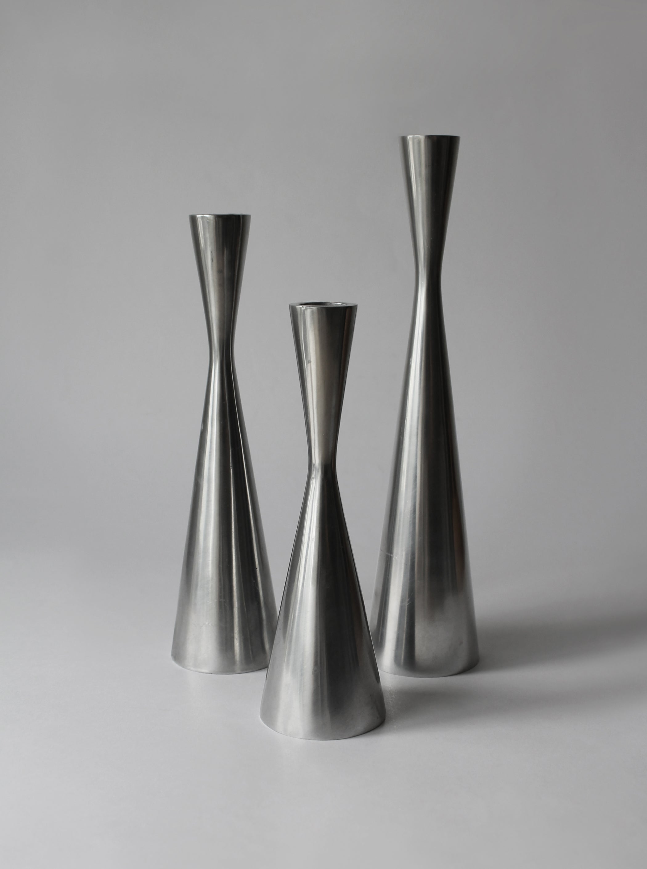 Polished Aluminum Trio Set Of Candle Holders