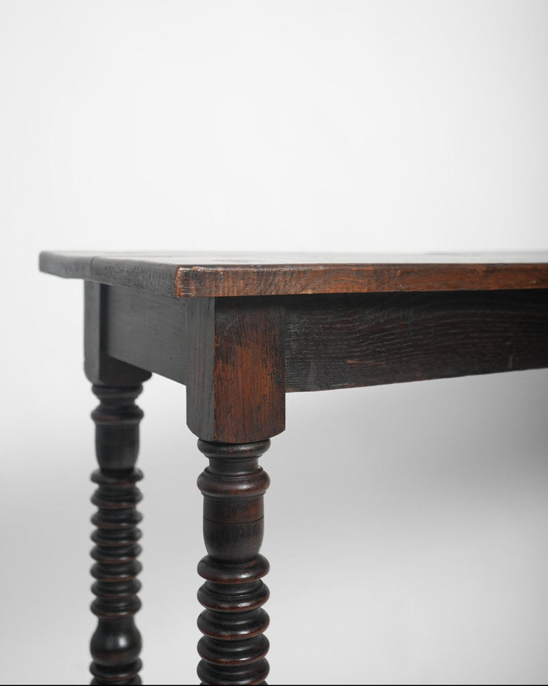 Spanish turned ebonised wood table console, 19th c. — side profile highlighting turned wooden legs