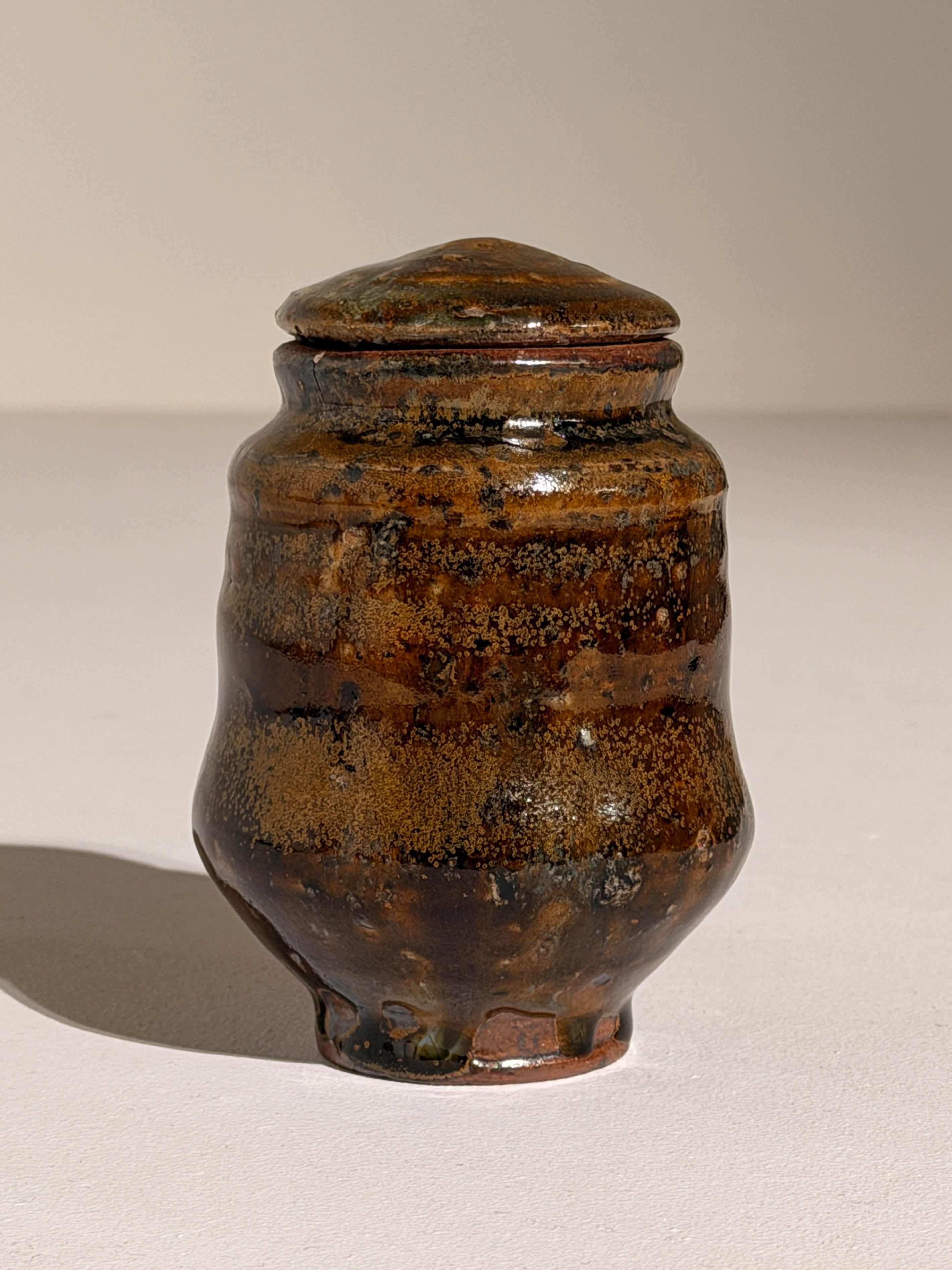 Covered glazed stoneware pot, France, circa 1960–1970. — lifestyle setting