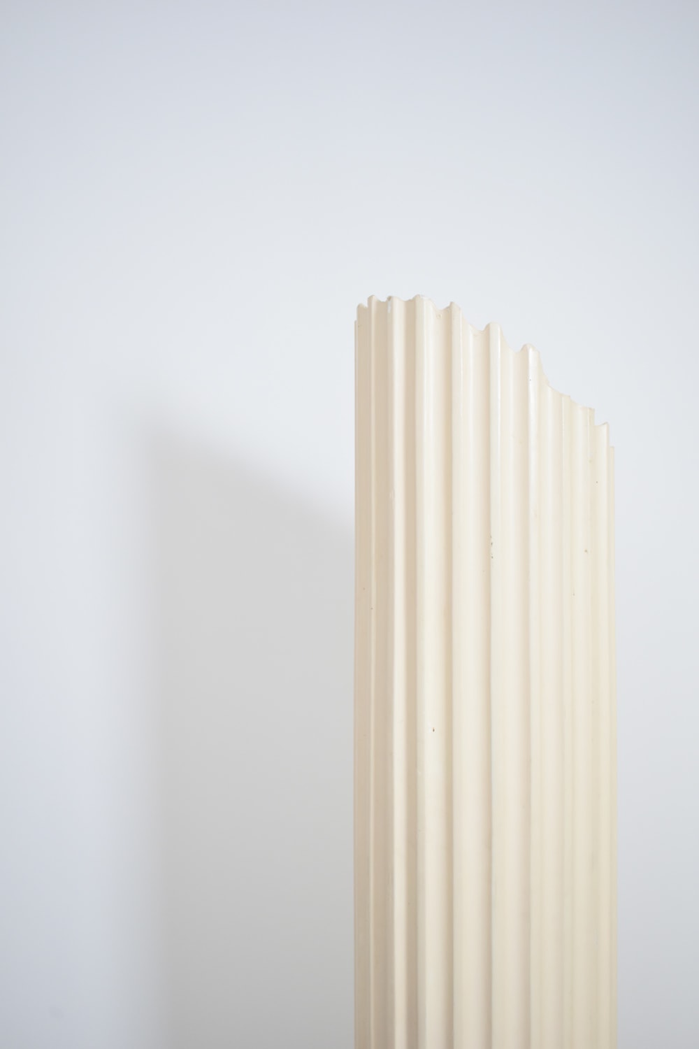 Plaster Column Floor Lamp, 1970s. — side angle highlighting textured cream surface