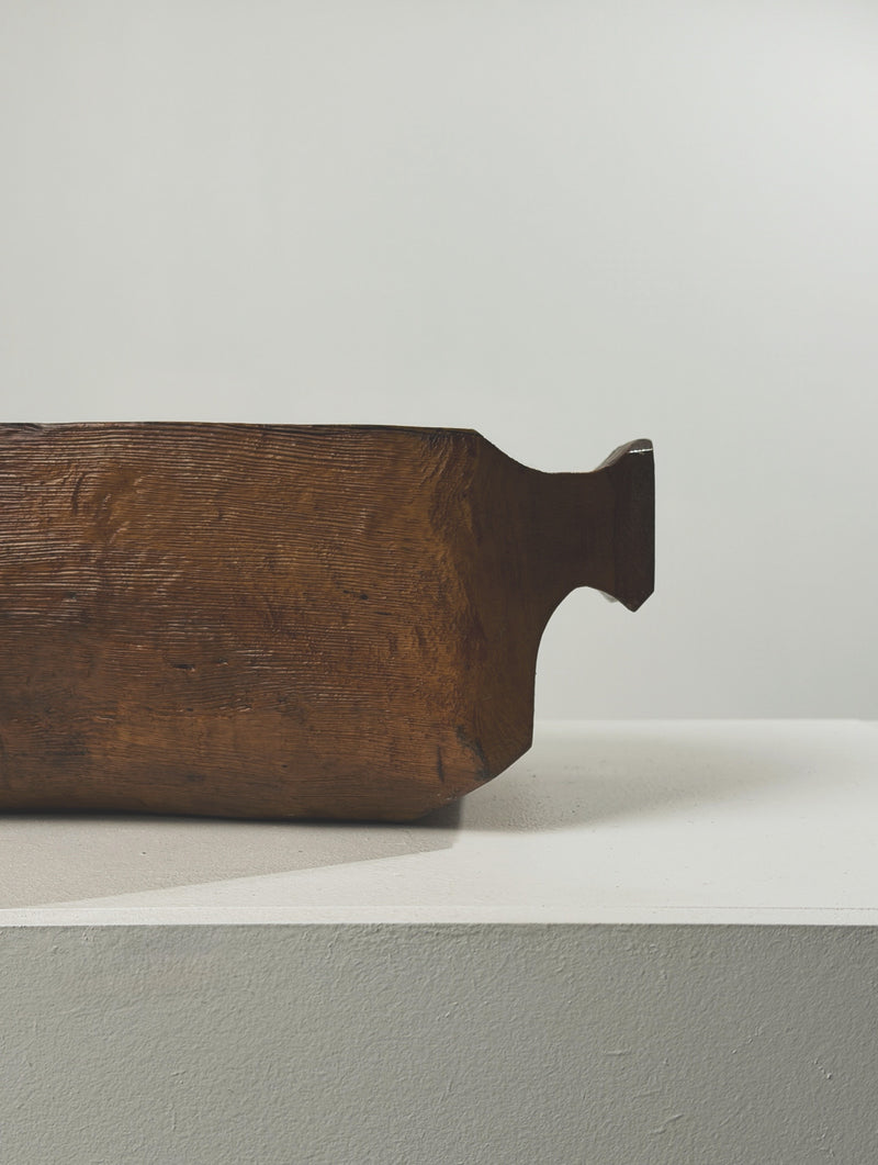 Large hand-carved wooden bowl, France, early 20th century — side view highlighting textured wood grain