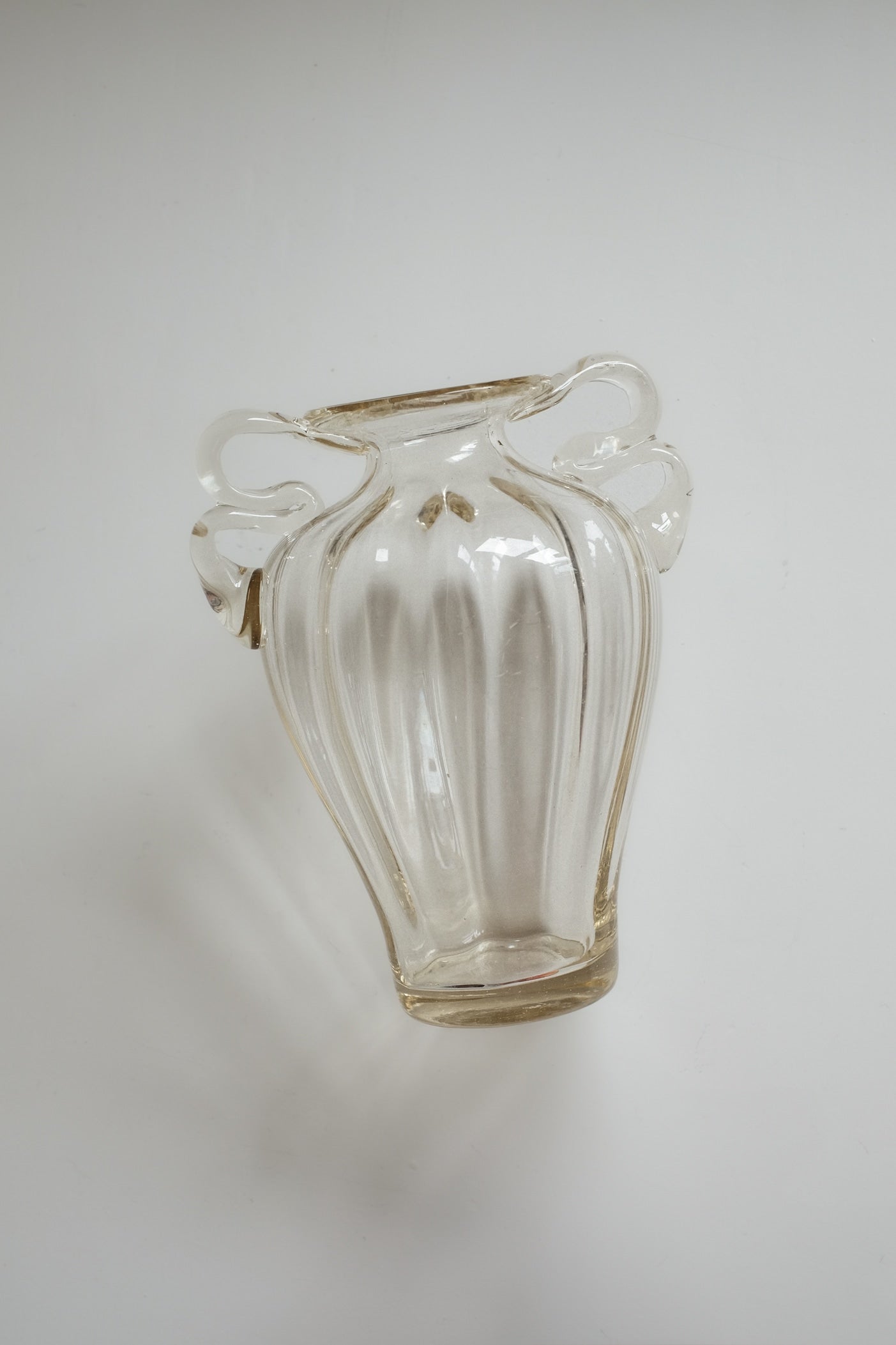 Elegant Handcrafted Glass Vase with Decorative Handles by septembre studios | The Oblist