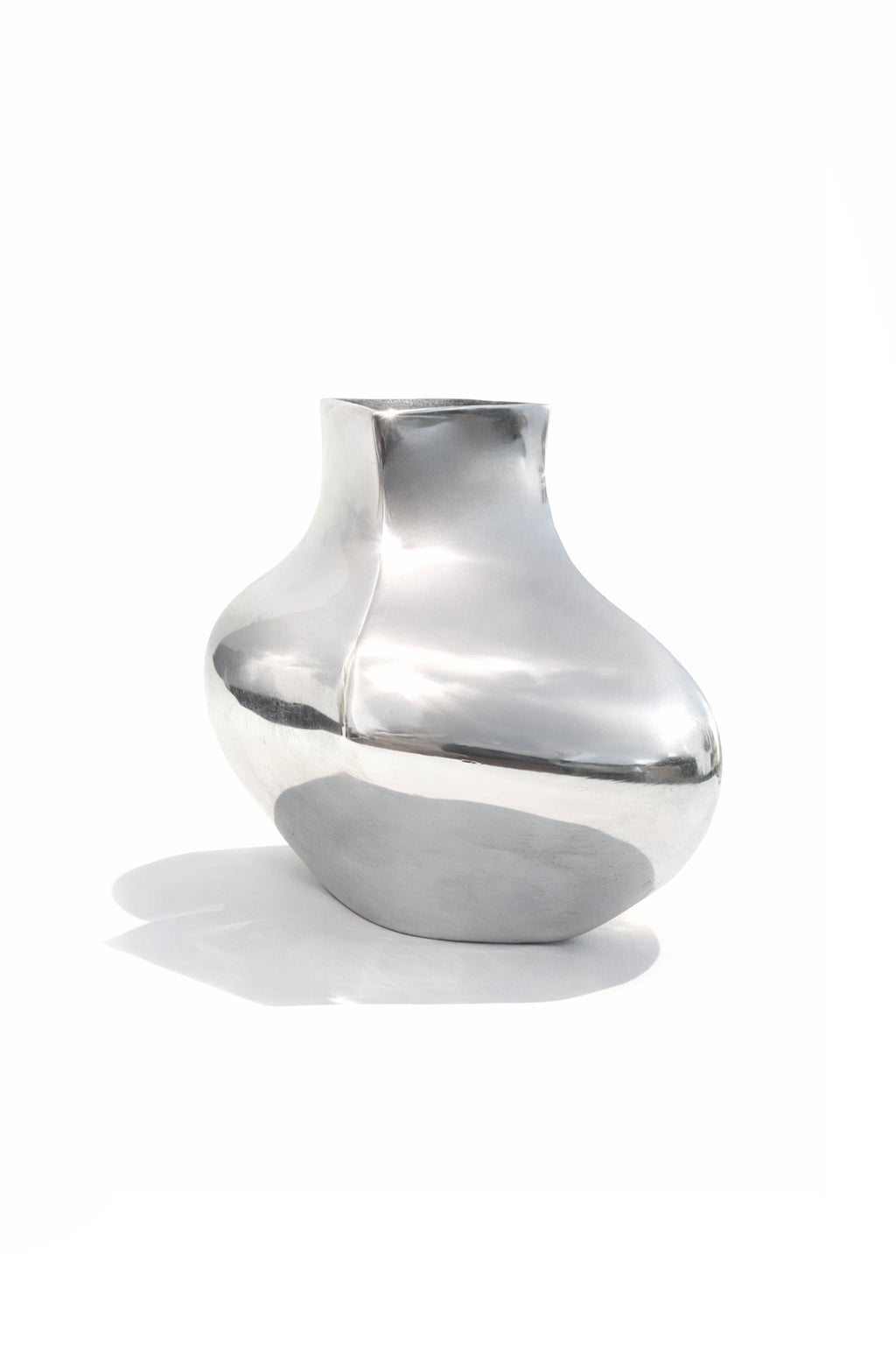 Sculptural Chrome Vase — back view highlighting reflective surface