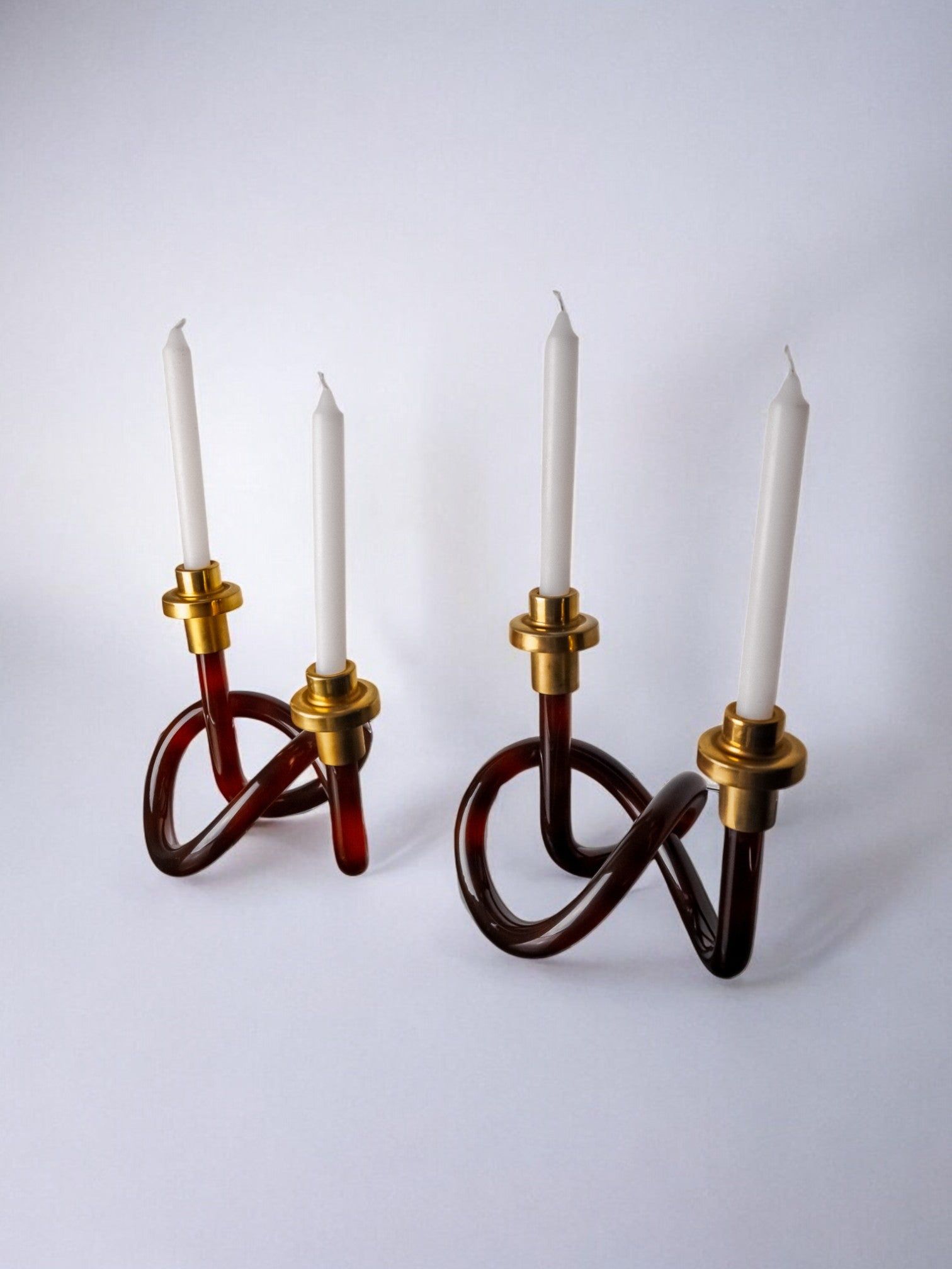 Pair of Candleholders by Dorothy Thorpe, 1970s — angled view with red and brass elements