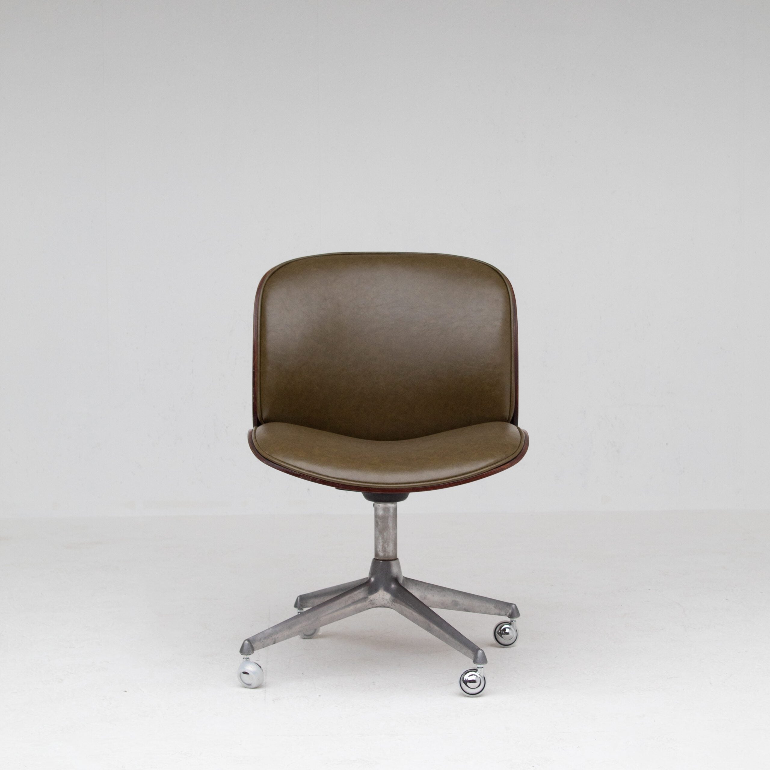 Ico Parisi Office Chair in Wood and Metal — side angle showing brown leather seat and metal base