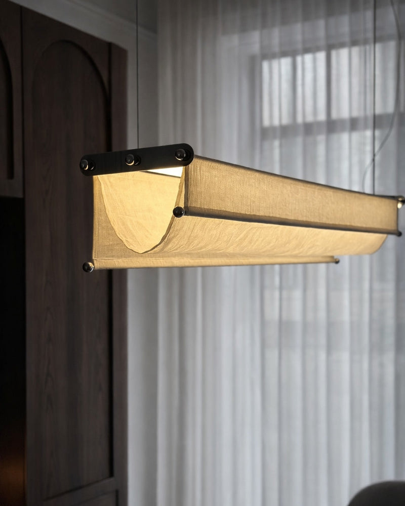 Vento Pendant — close-up of linen shade and metal frame