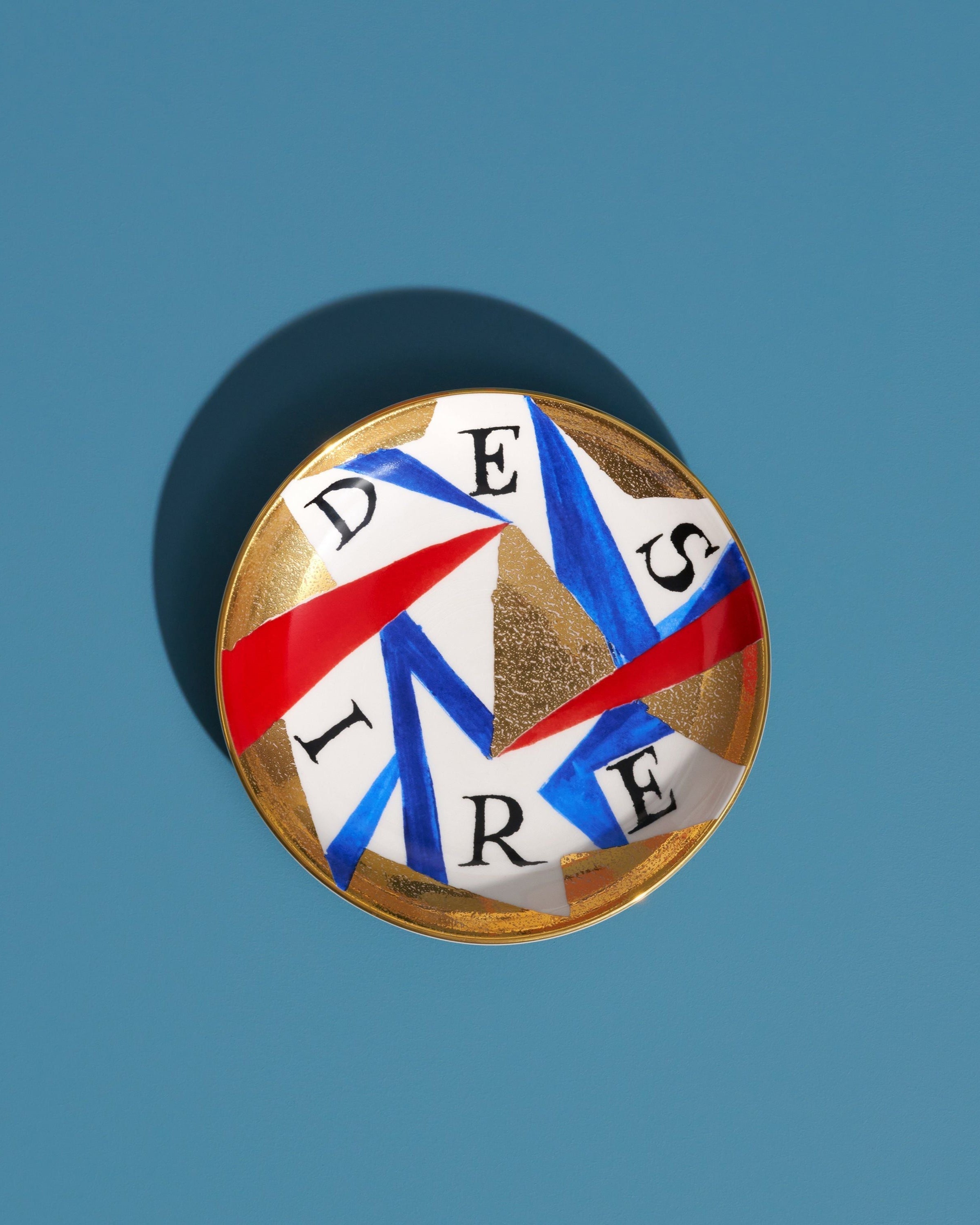 Ruan Hoffmann Desire Plate — angled view showing colorful geometric design