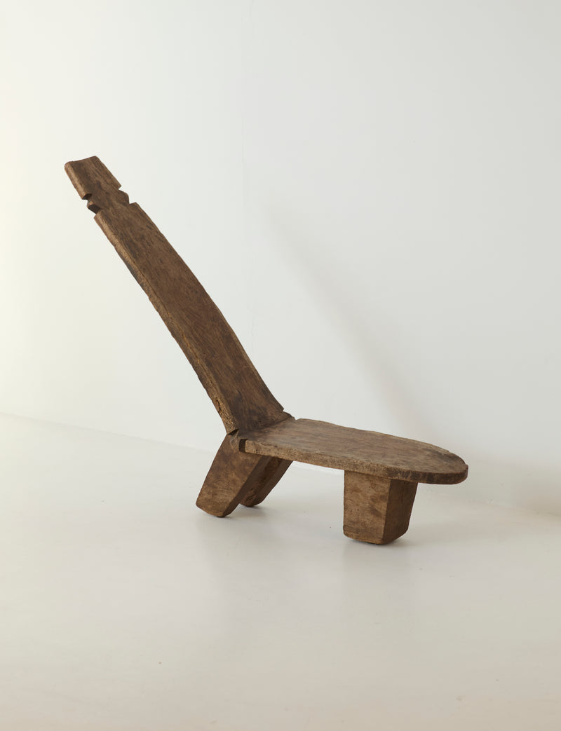 West African Monoxyle Lobi / Stargazer Chair, C. 1950 — side profile of handcrafted wooden chair
