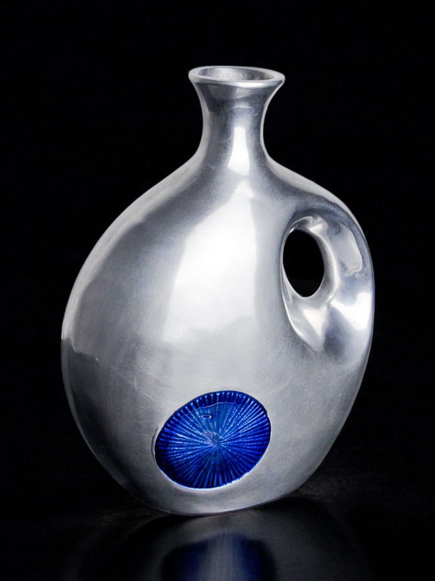 Biomorphic Base by Art3, Spain, 1980s — close-up of polished silver surface with blue detail