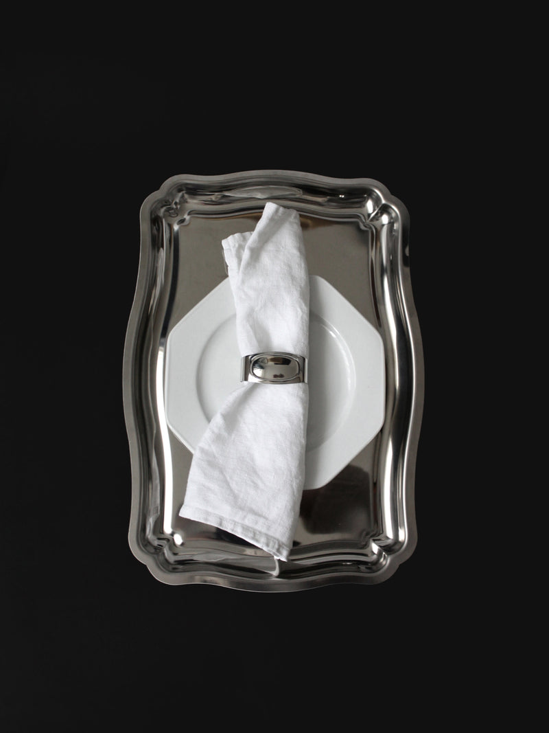 Stainless Steel WMF Napkin Rings, Germany, 1970s — top view on silver tray with napkin