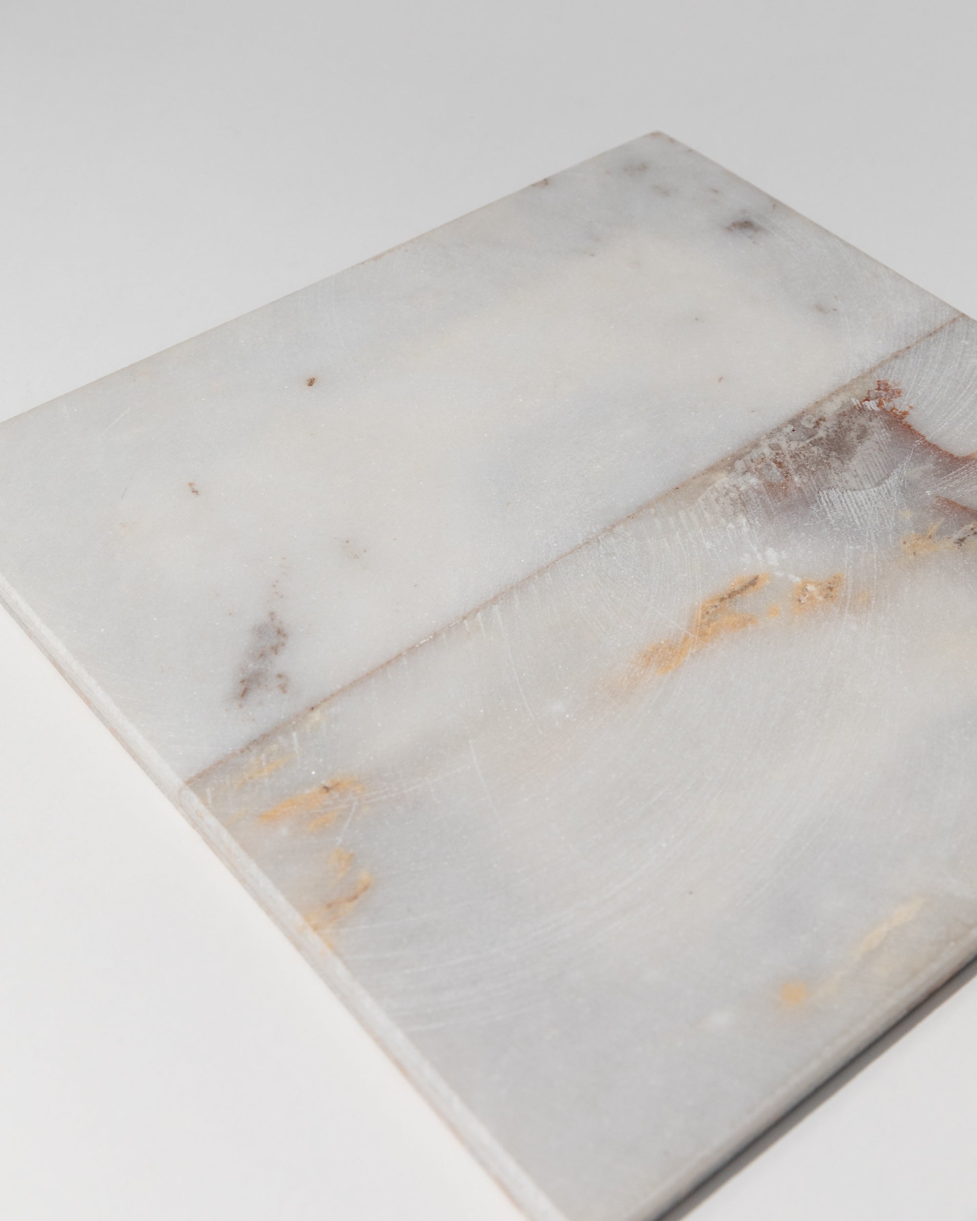 Close-up view of vintage marble chessboard surface with grey veining