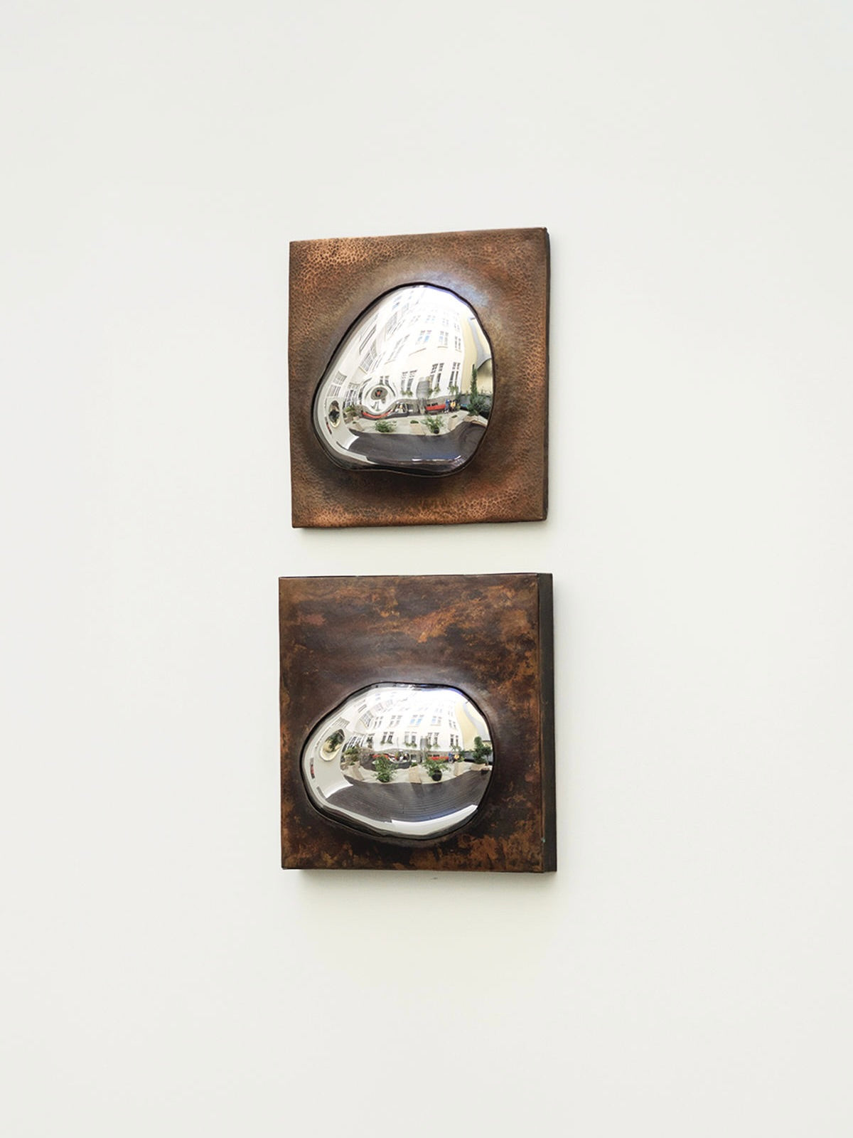 Drop Of Silver On Copper III' Wall Sculpture — close-up of mirrored surface on copper background