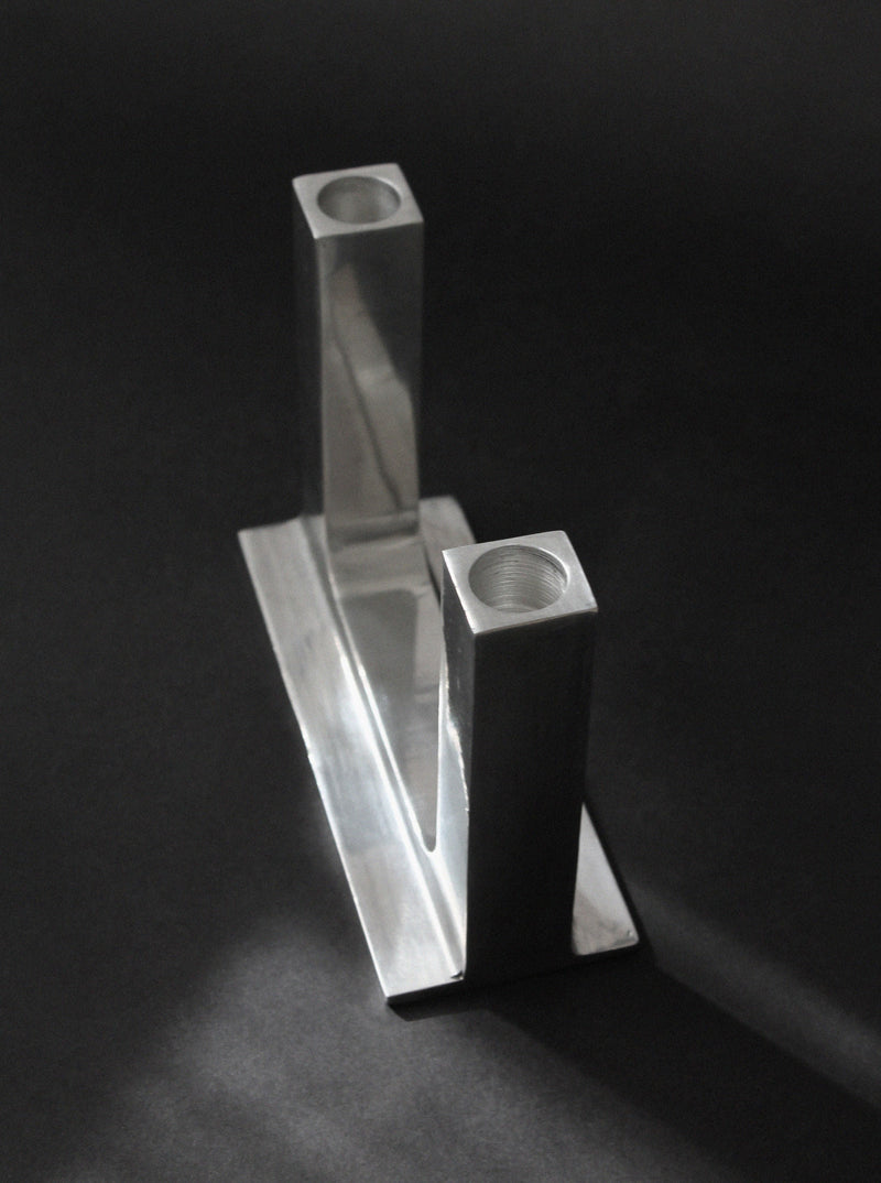 Brutalist aluminum candle holder angular geometric design detail