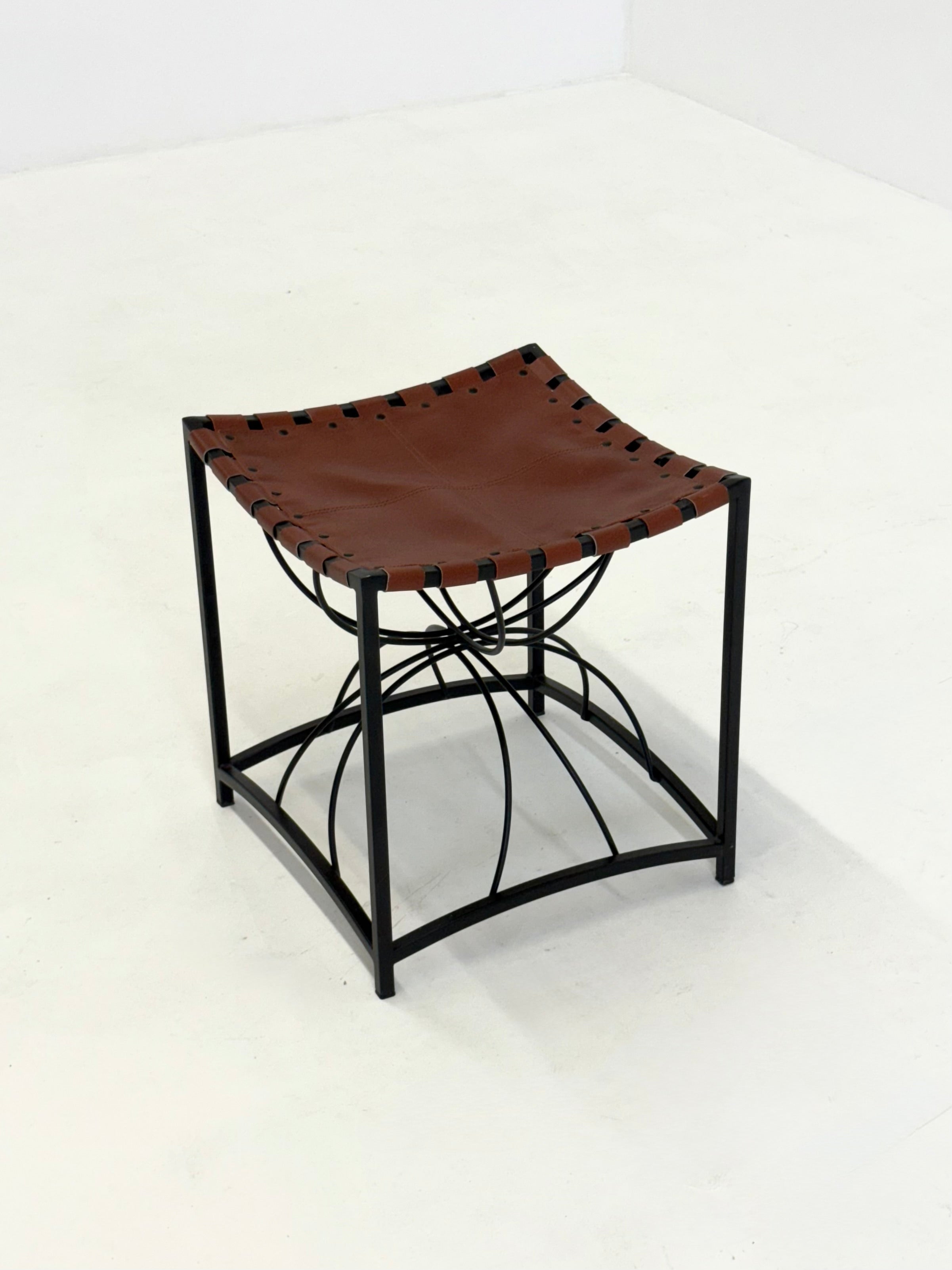 Elegant vintage French stool with black metal and brown leather by Wintage | The Oblist