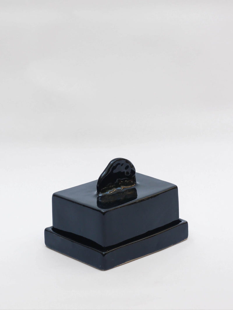 Stoneware butterdish — detail view