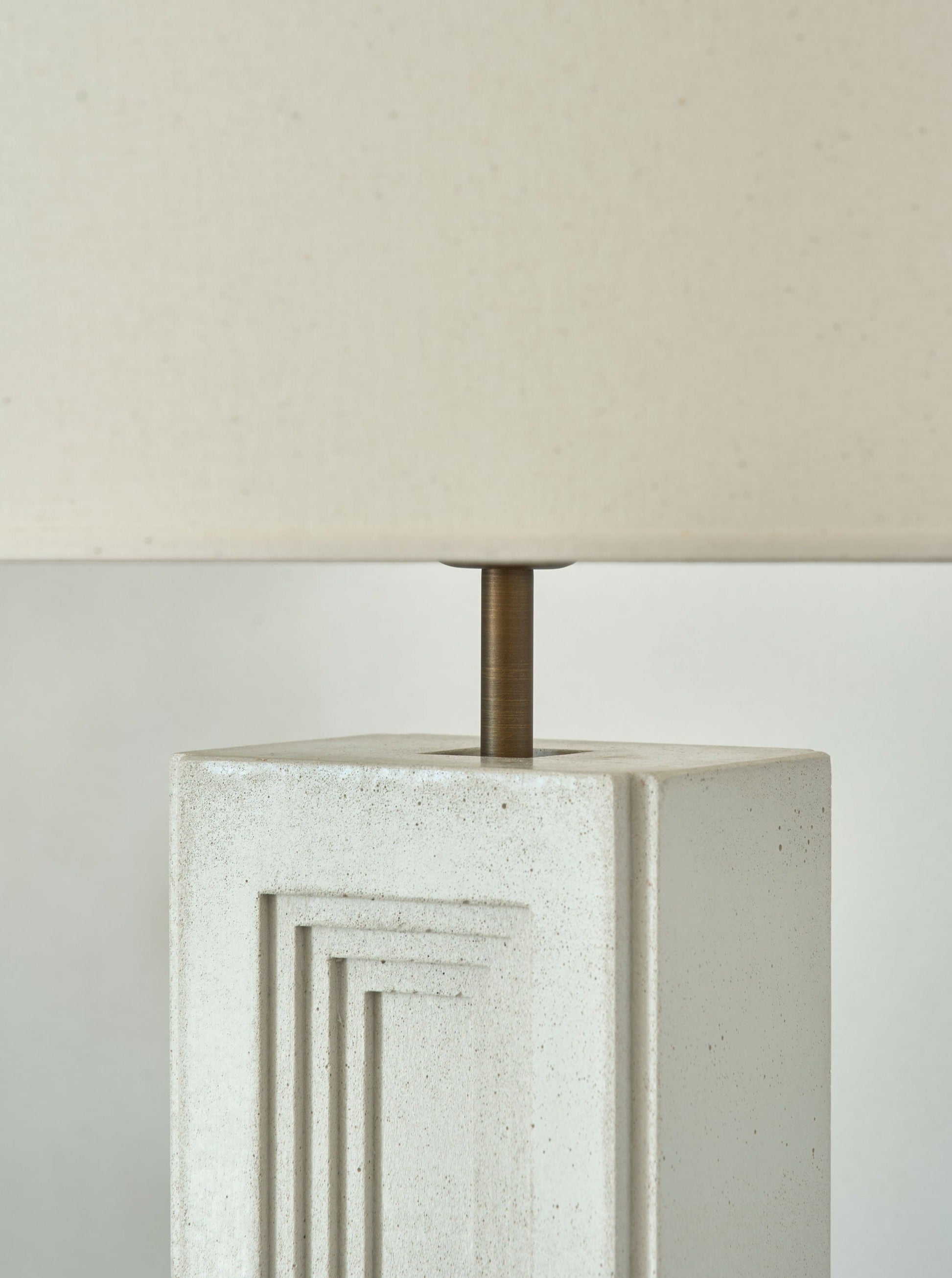 Nini Lamp — close-up of textured white ceramic base