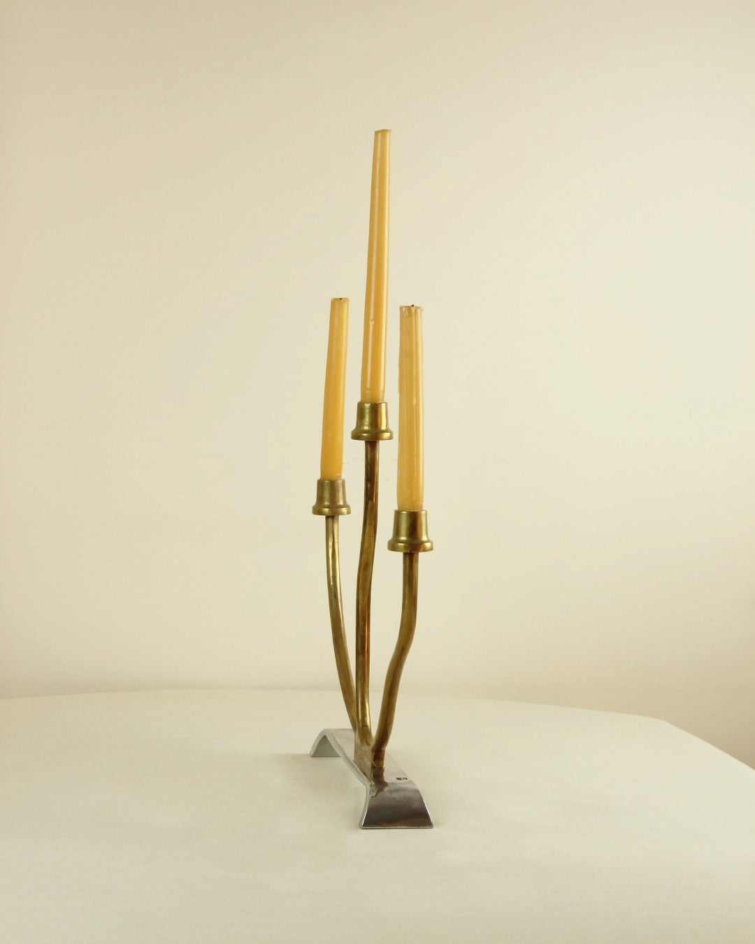 Brutalist Candleholder — back view showing brass and silver materials