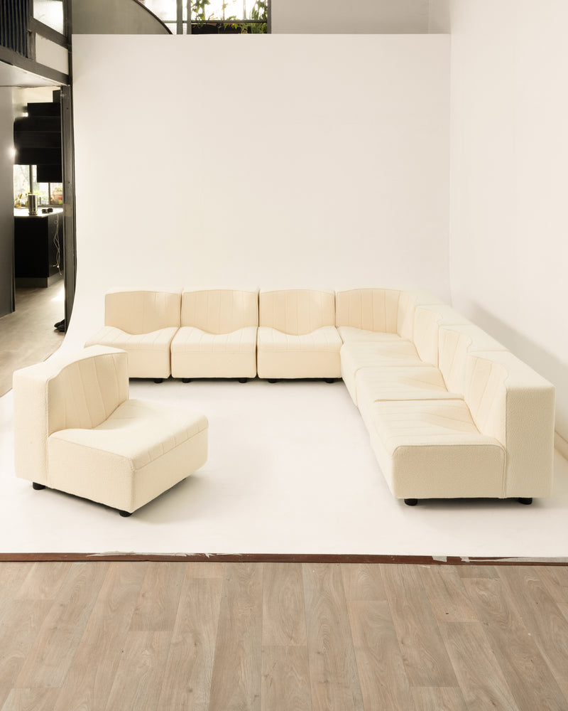 Beige modular sofa system by Tito Agnoli in minimalist interior