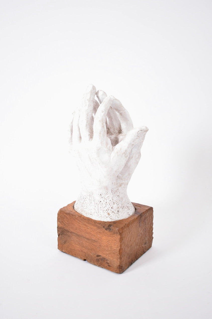 The Rodin Style Plaster and Wood Sculpture, 1960s by Barracuda Interiors features two gently cupped hands on a square wooden base, displayed against a plain white background.