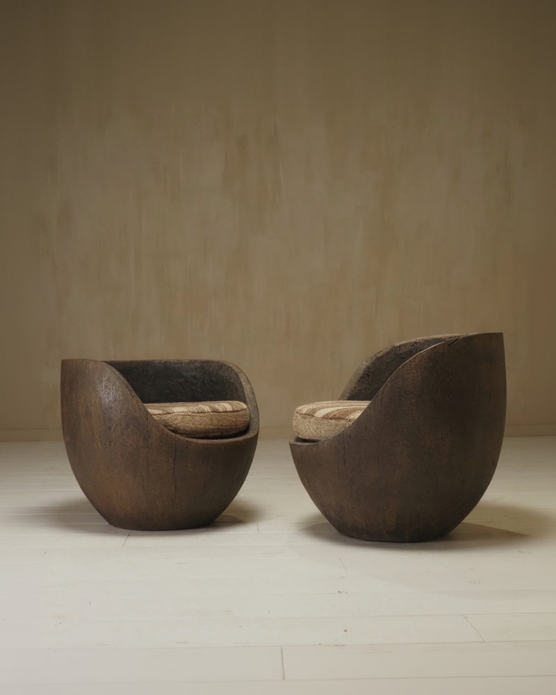 Sculptural mid-century hand-carved pair lounge chairs — alternate view