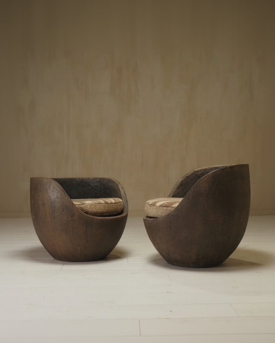 Sculptural mid-century hand-carved pair lounge chairs — alternate view