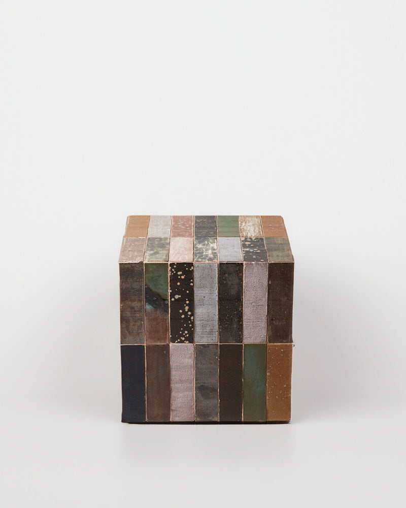 Minerales Side Table — close-up of multi-colored stone surface