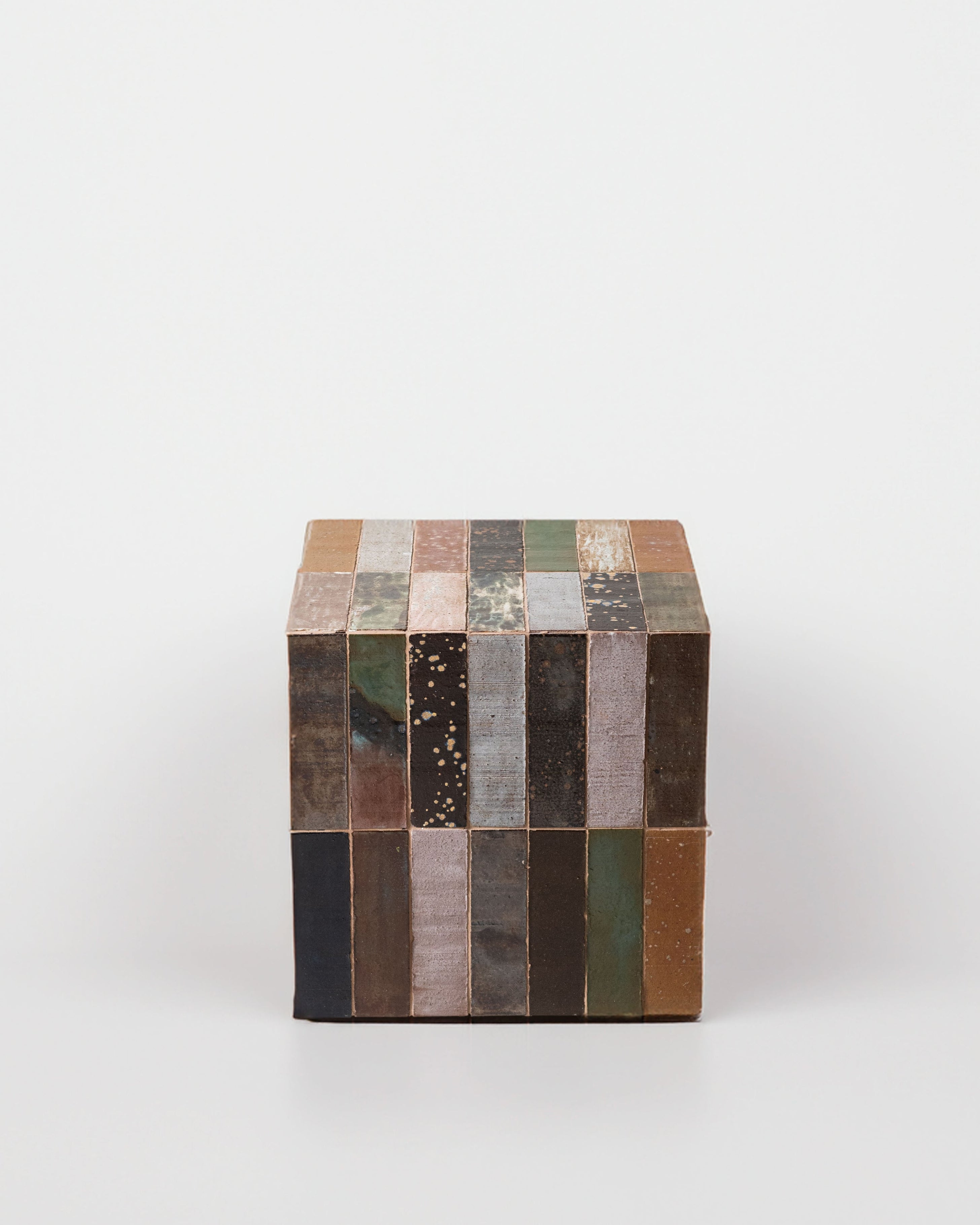 Minerales Side Table — close-up of multi-colored stone surface