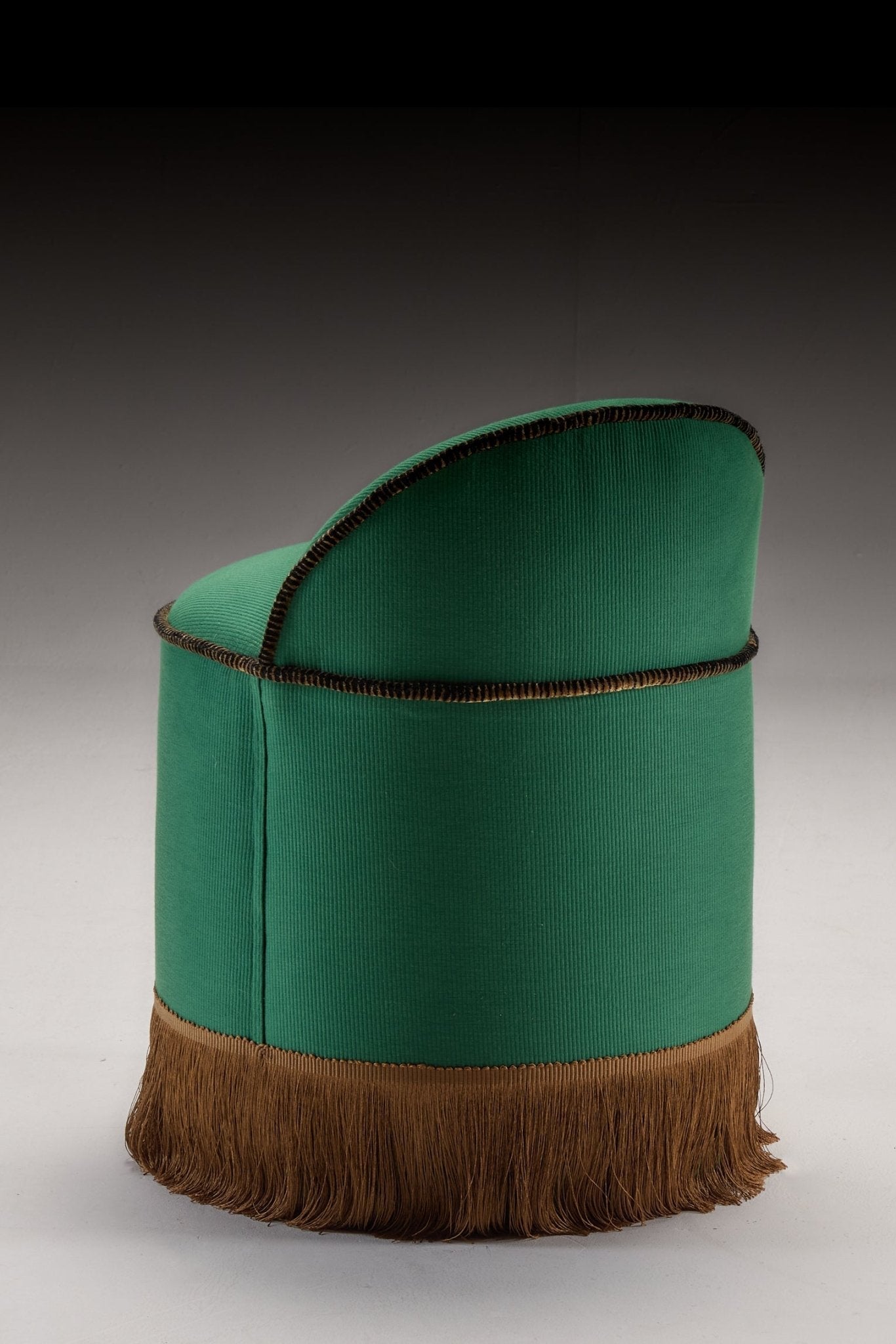 INFERI STOOL - CC'S REPP — side view of green upholstered stool with fringe