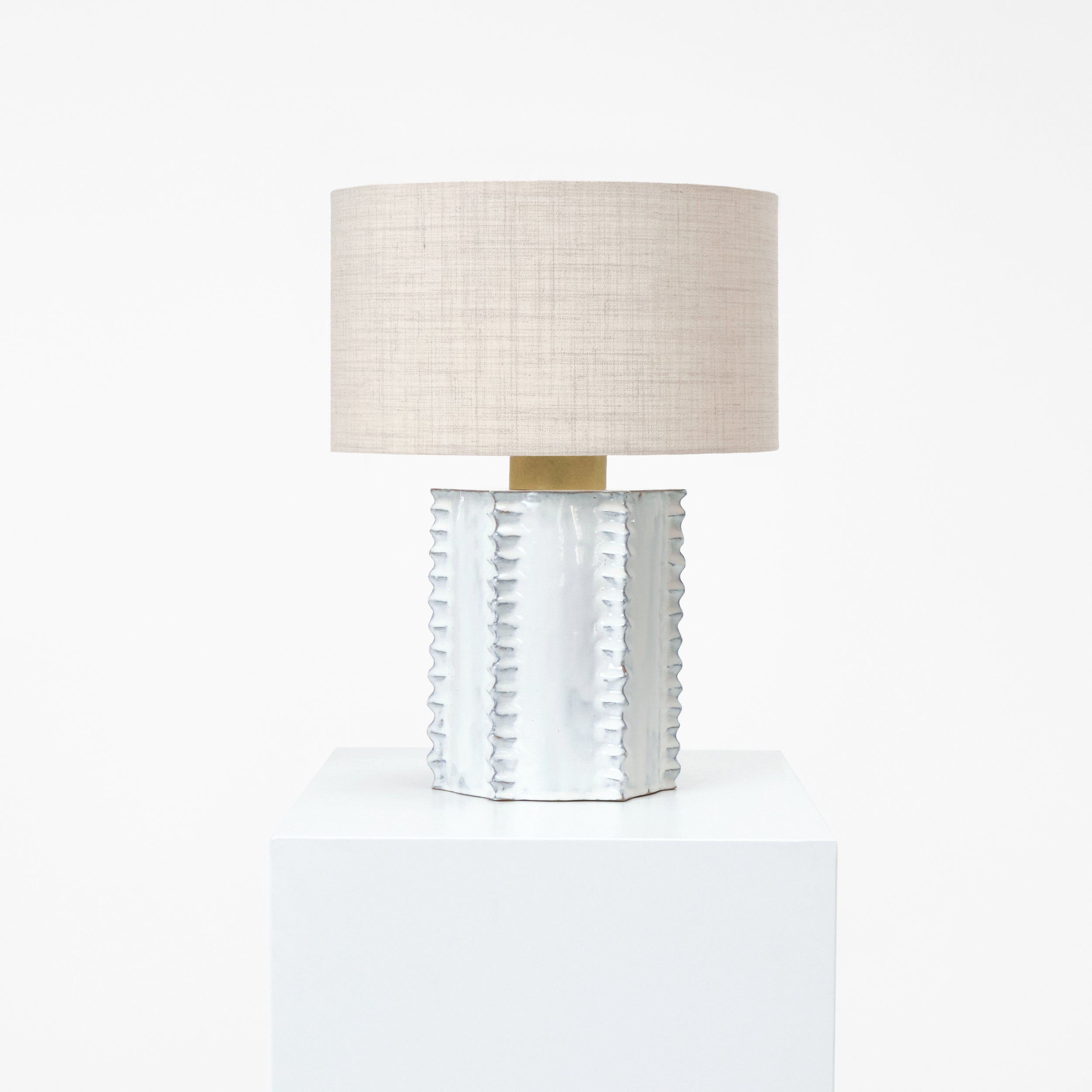 Totem Table Light — top view of textured white ceramic base