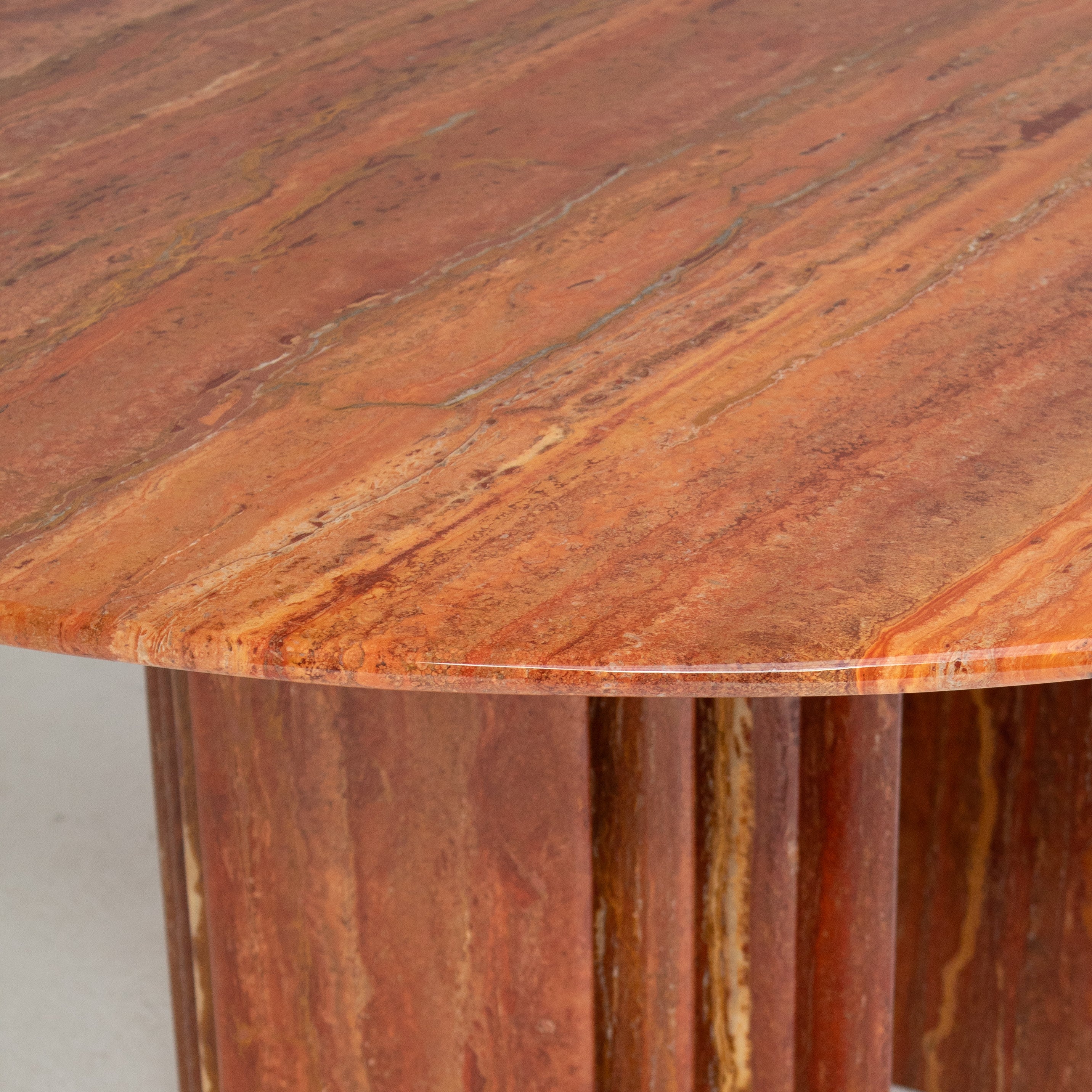 Round Dining Table in Rosso Travertino