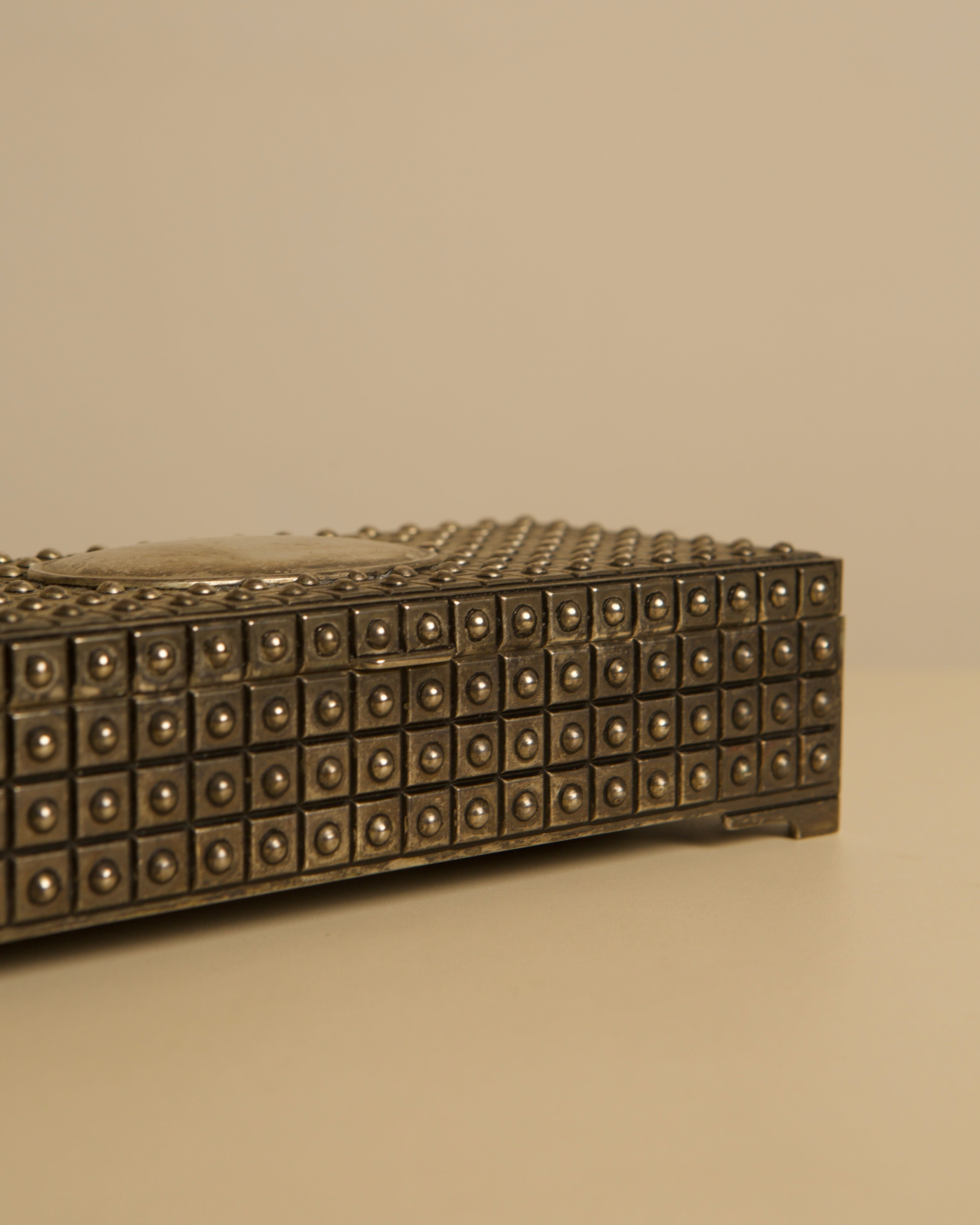 Italian studded metal jewelry box with blue velvet interior, 1950s — close-up