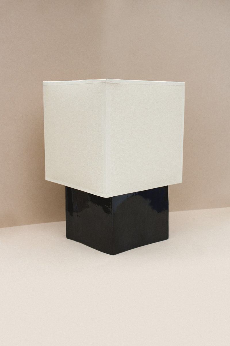 Barragán Lamp (Negro) — close-up of black ceramic base and white shade