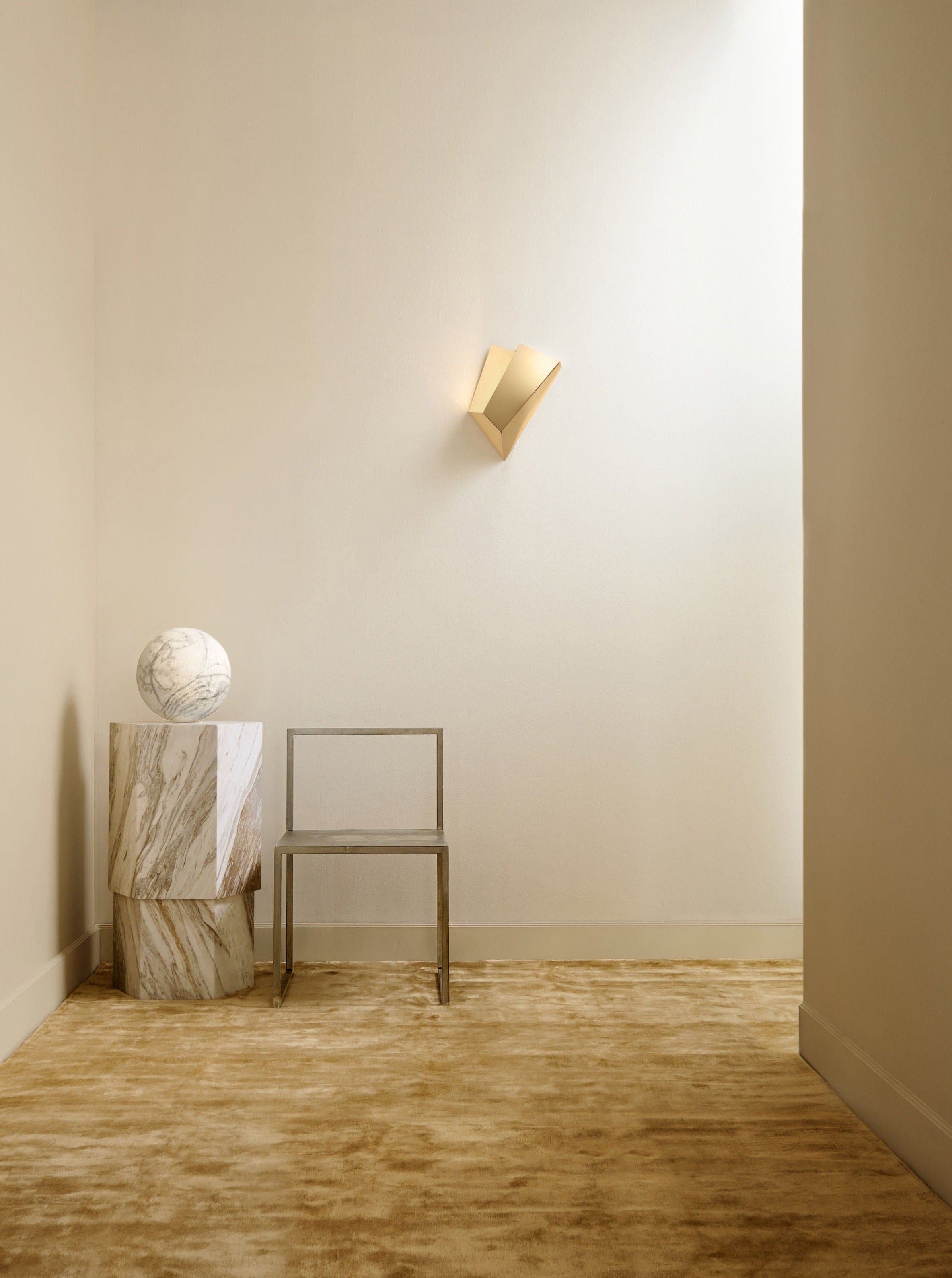 Katoptris Gold Wall Light — installed in minimalist corner setting