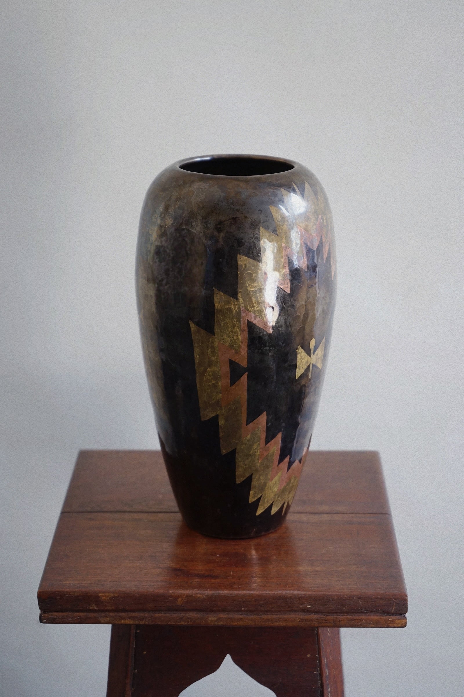 Art Deco Dinanderie Vase, c.1925 — close-up of patterned brass and dark surface