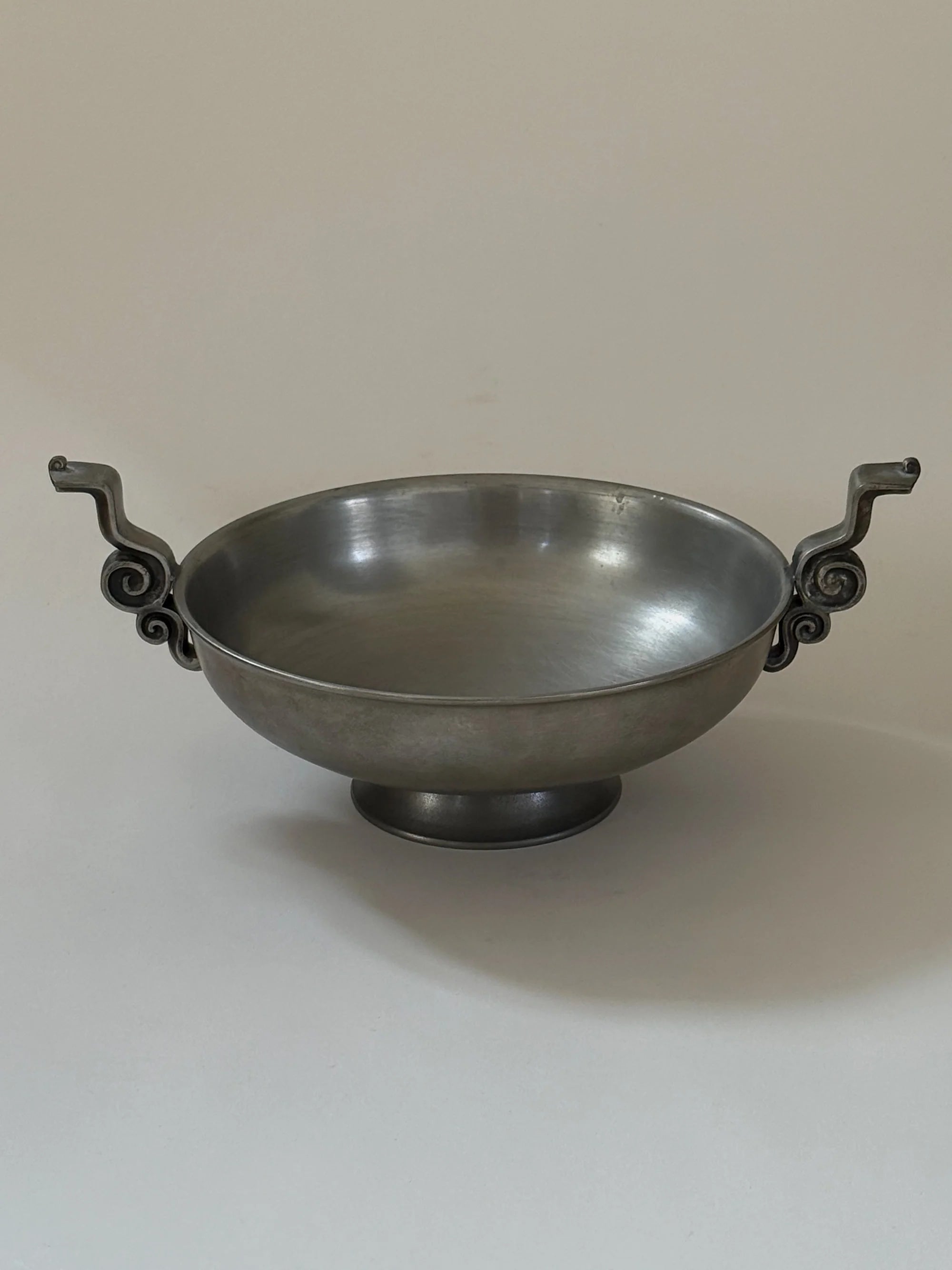 Pewter Bowl with Scroll Handles Edvin Ollers, 1952 — close-up of bowl with scroll handles