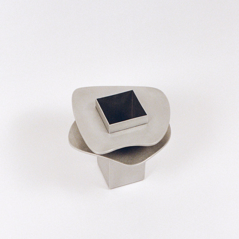 Flange Vase — top view of brushed metal design
