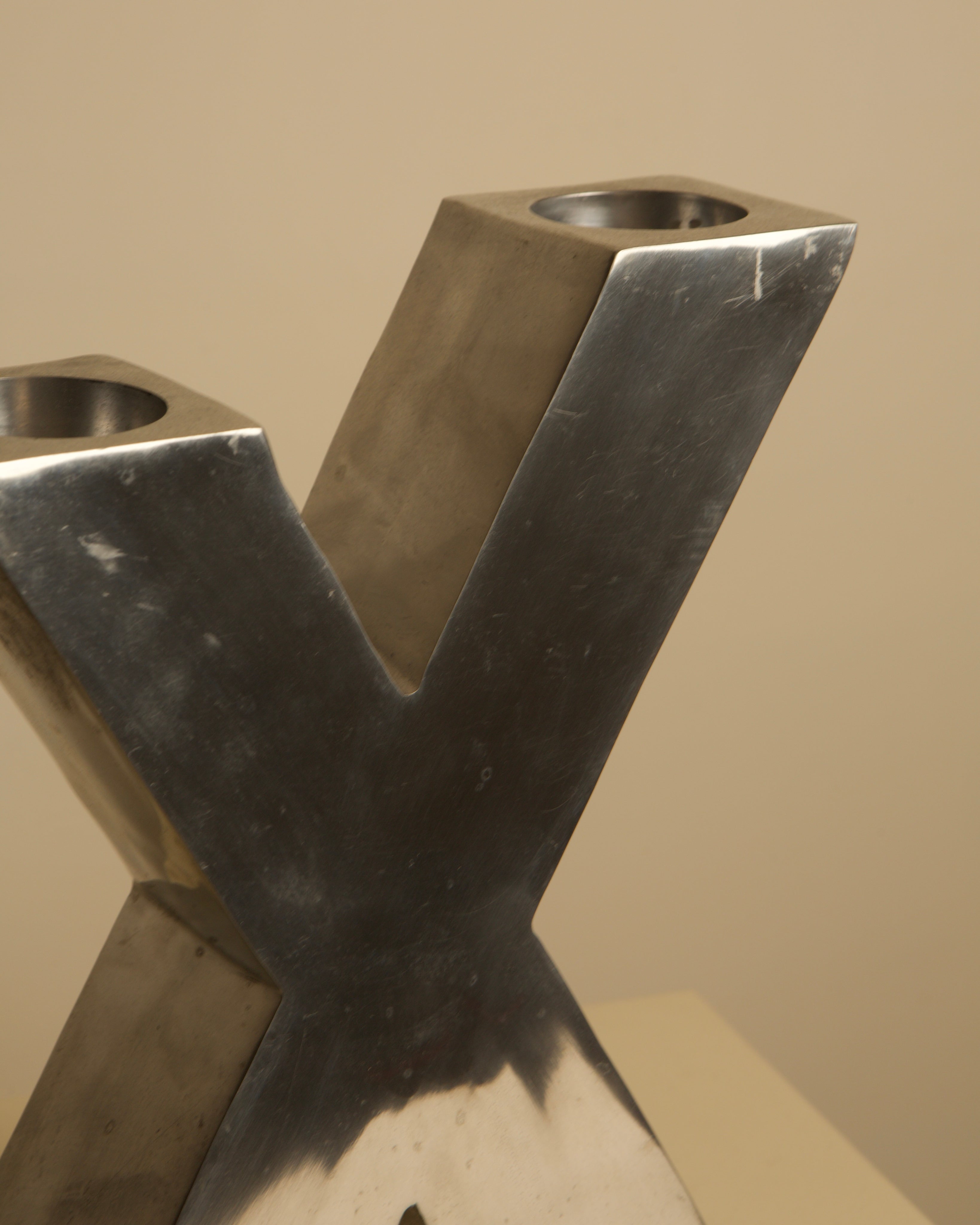 Large "X" Candleholder in Cast Aluminum 80's — side angle showing brushed aluminum finish