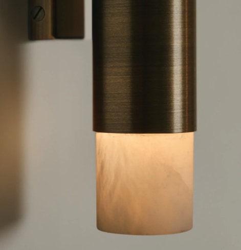 ROMA Wall — close-up of brass fixture with marble shade