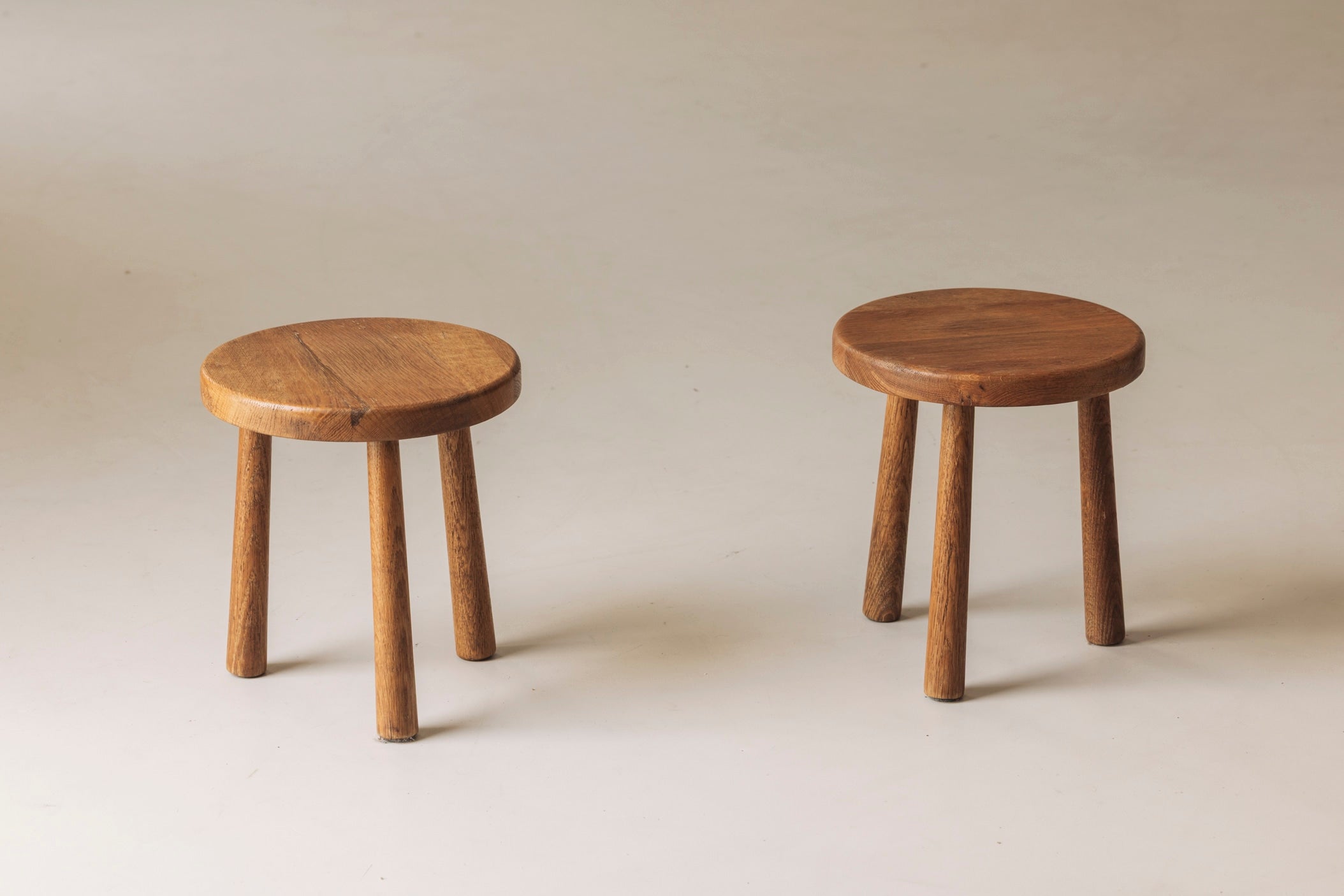 Sculptural Set of Two Solid Oak Stools, France, 1960s — side angle