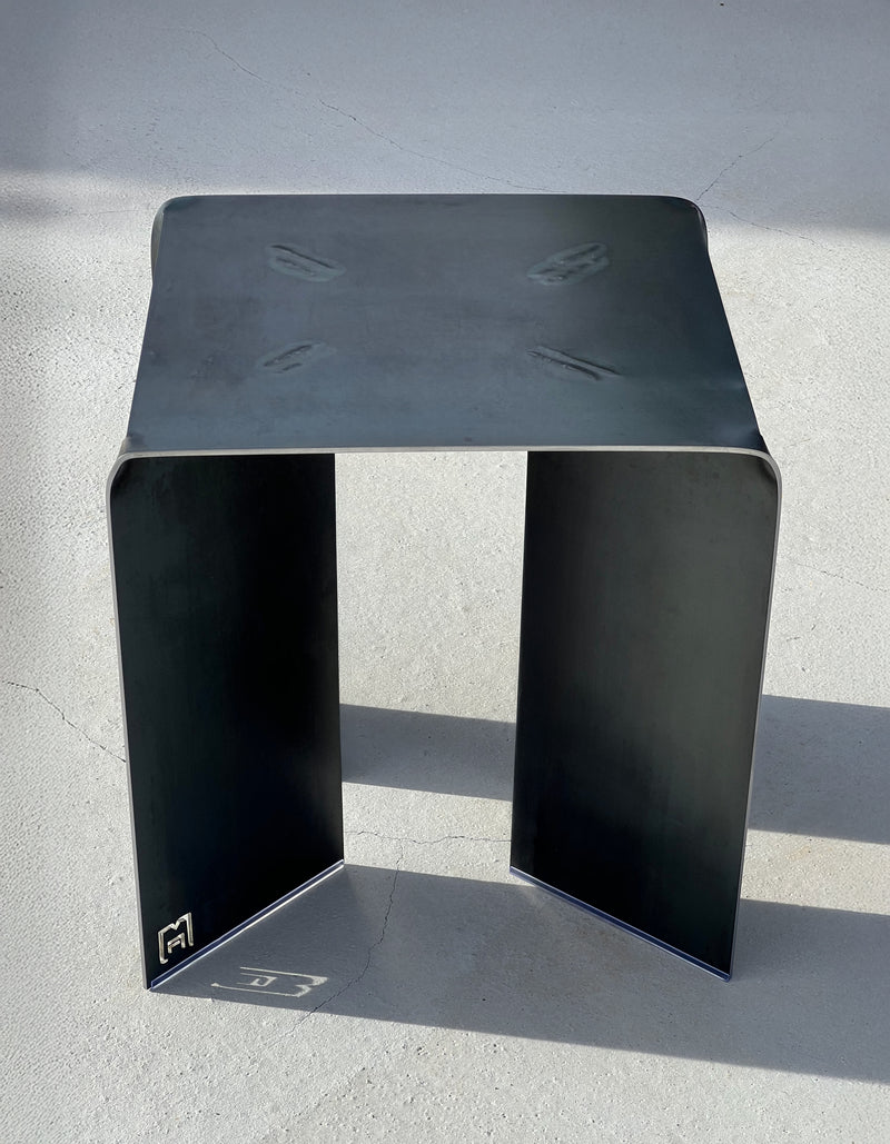 SHIRO Stool — close-up of black metal surface and edges