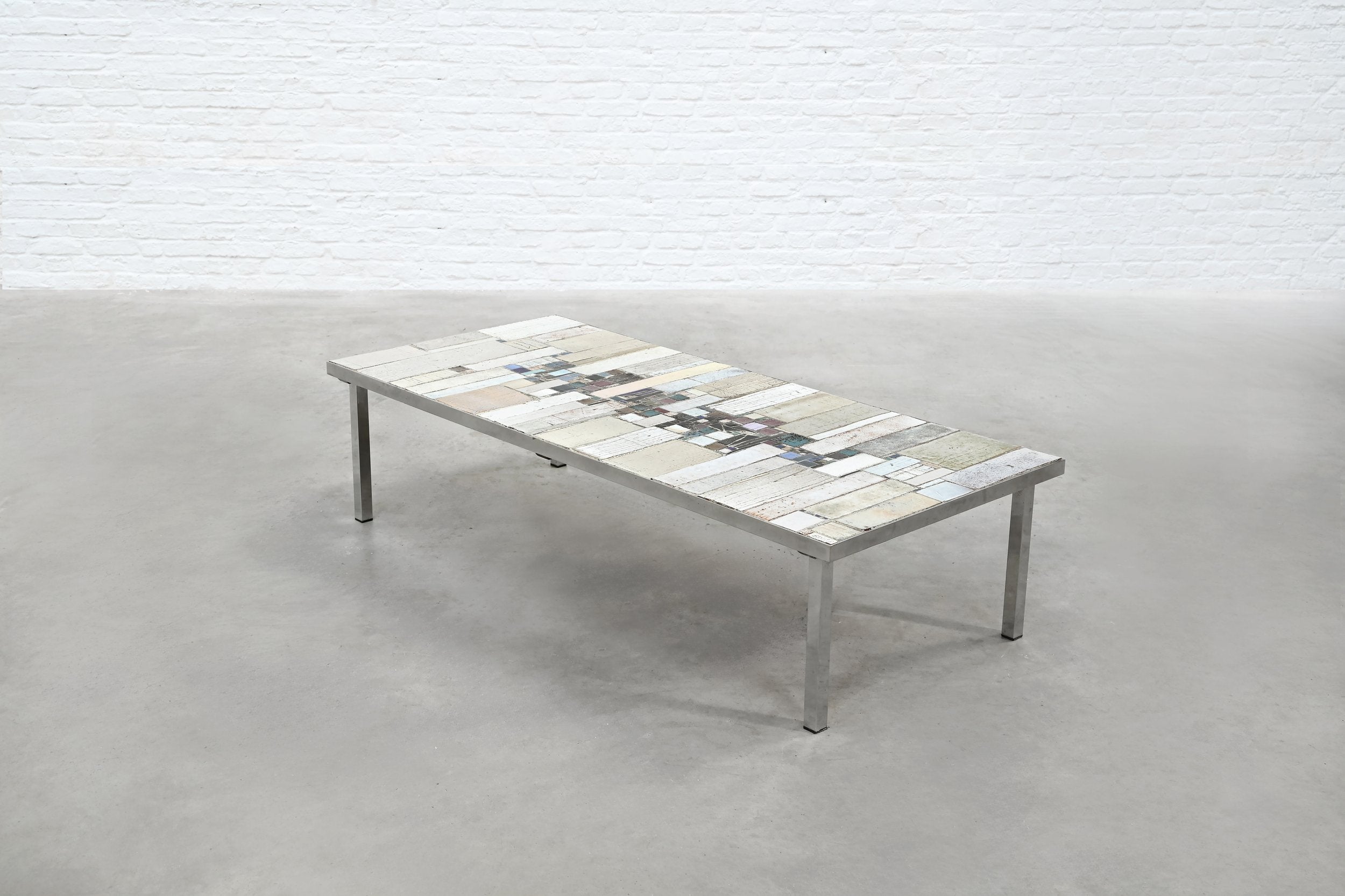 Brutalist Coffee Table by Pia Manu — side angle showing mixed material top
