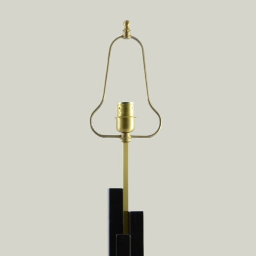 "SKYLINE "Table Lamp in black marble and satin brass — lifestyle setting