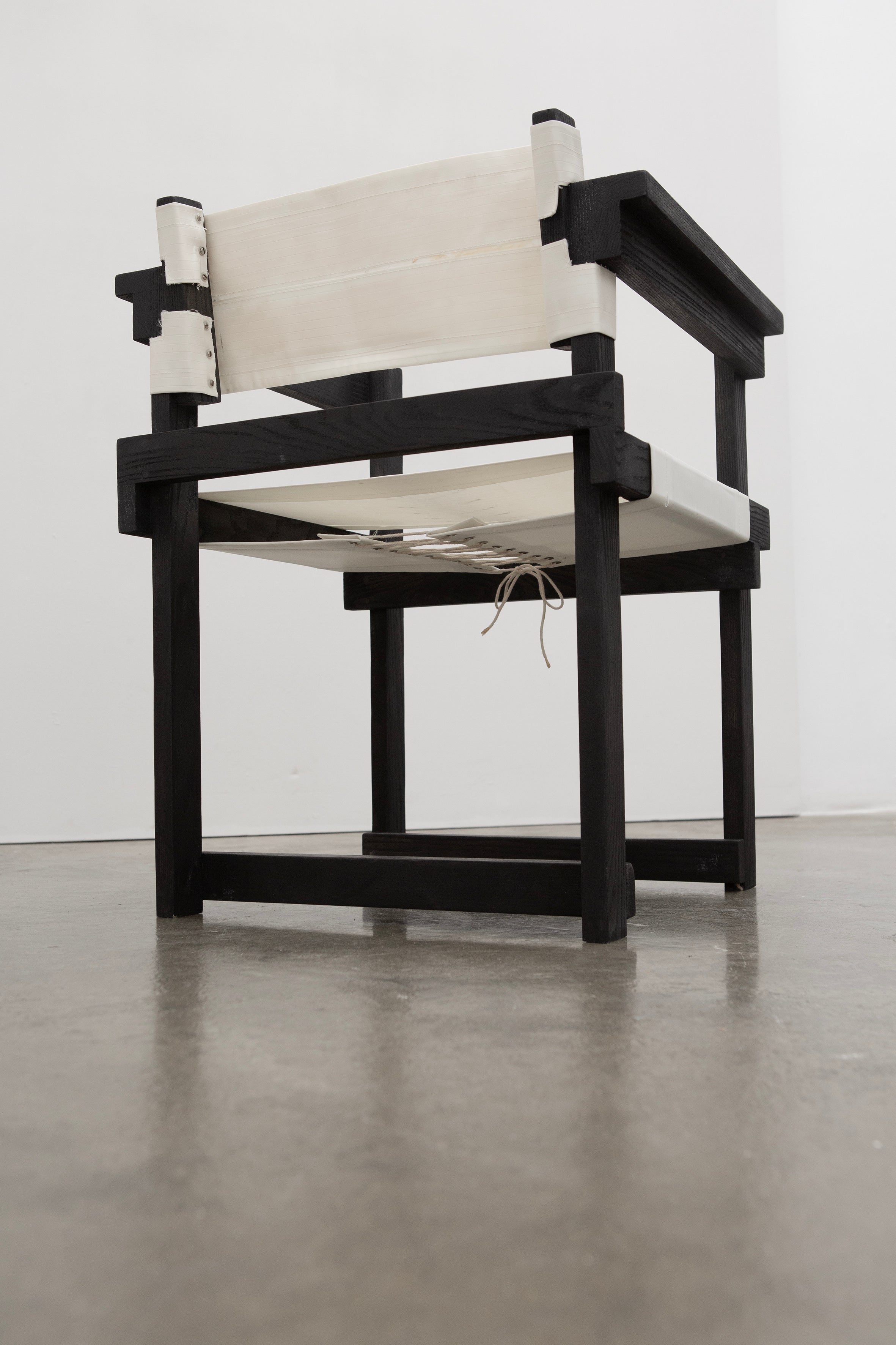 Modernist Dutch Chair after Gerrit Rietveld (1-6) — angled view on concrete floor